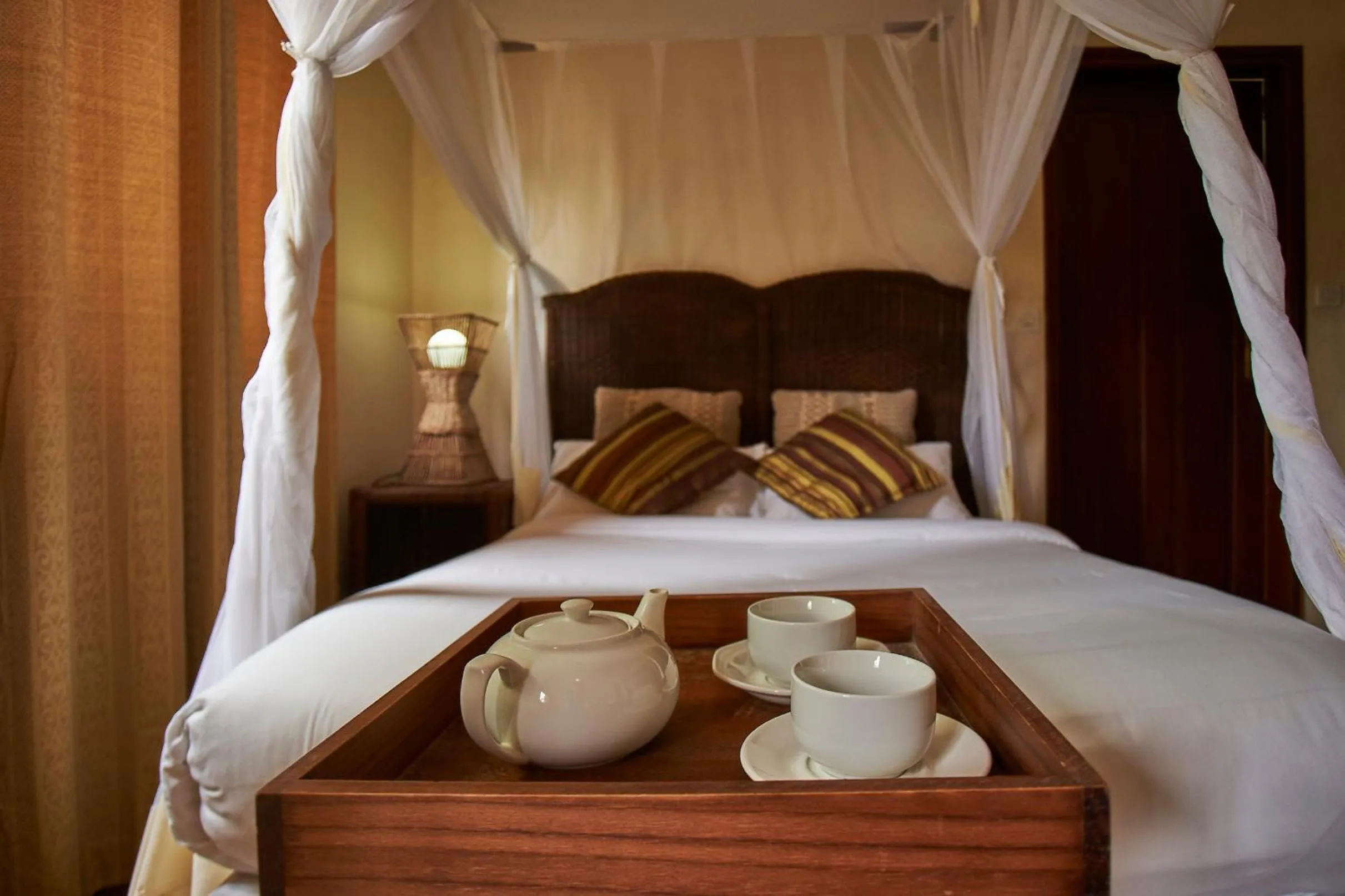 Bed in Catembe Gallery Hotel