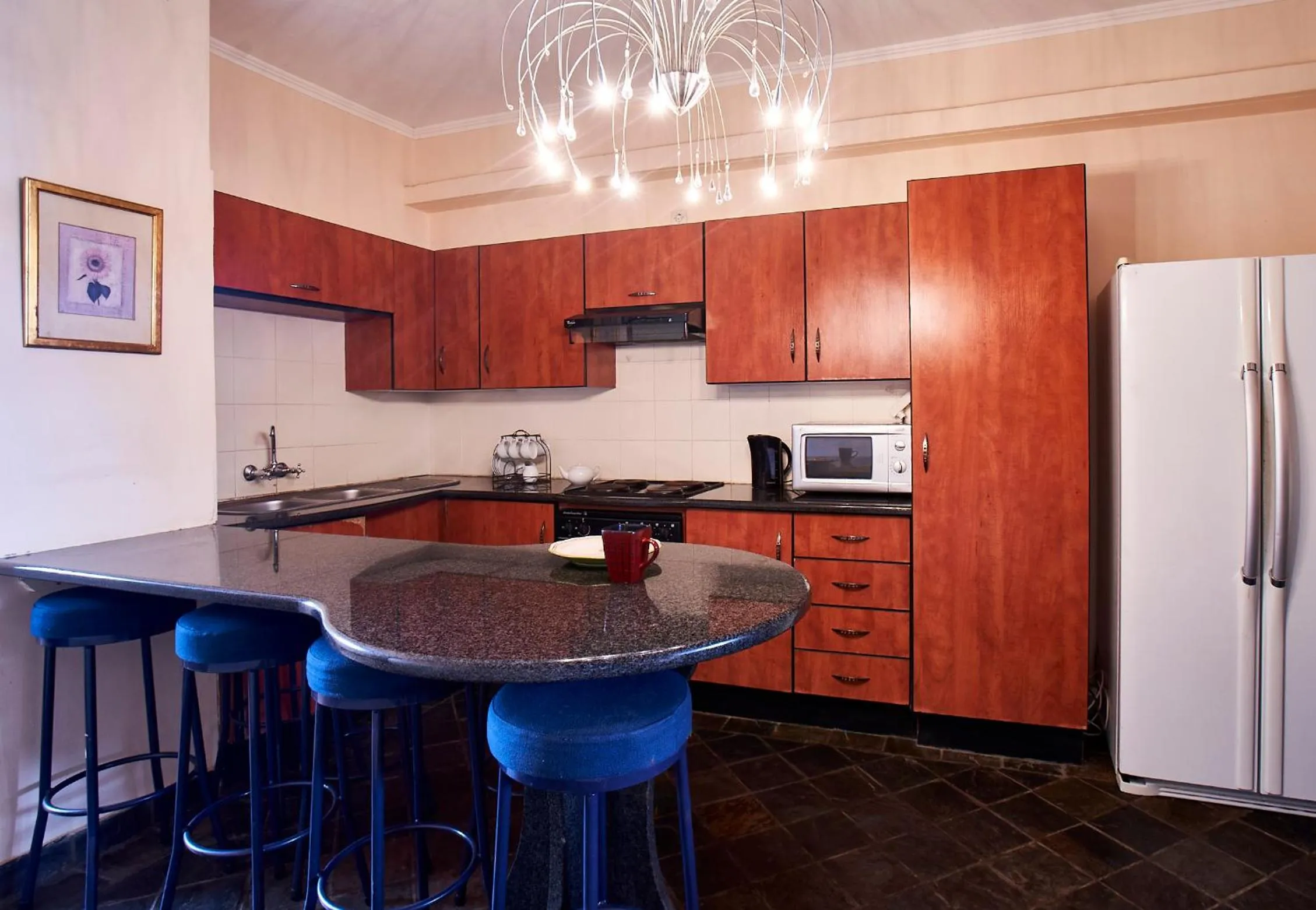 Kitchen or kitchenette in Catembe Gallery Hotel