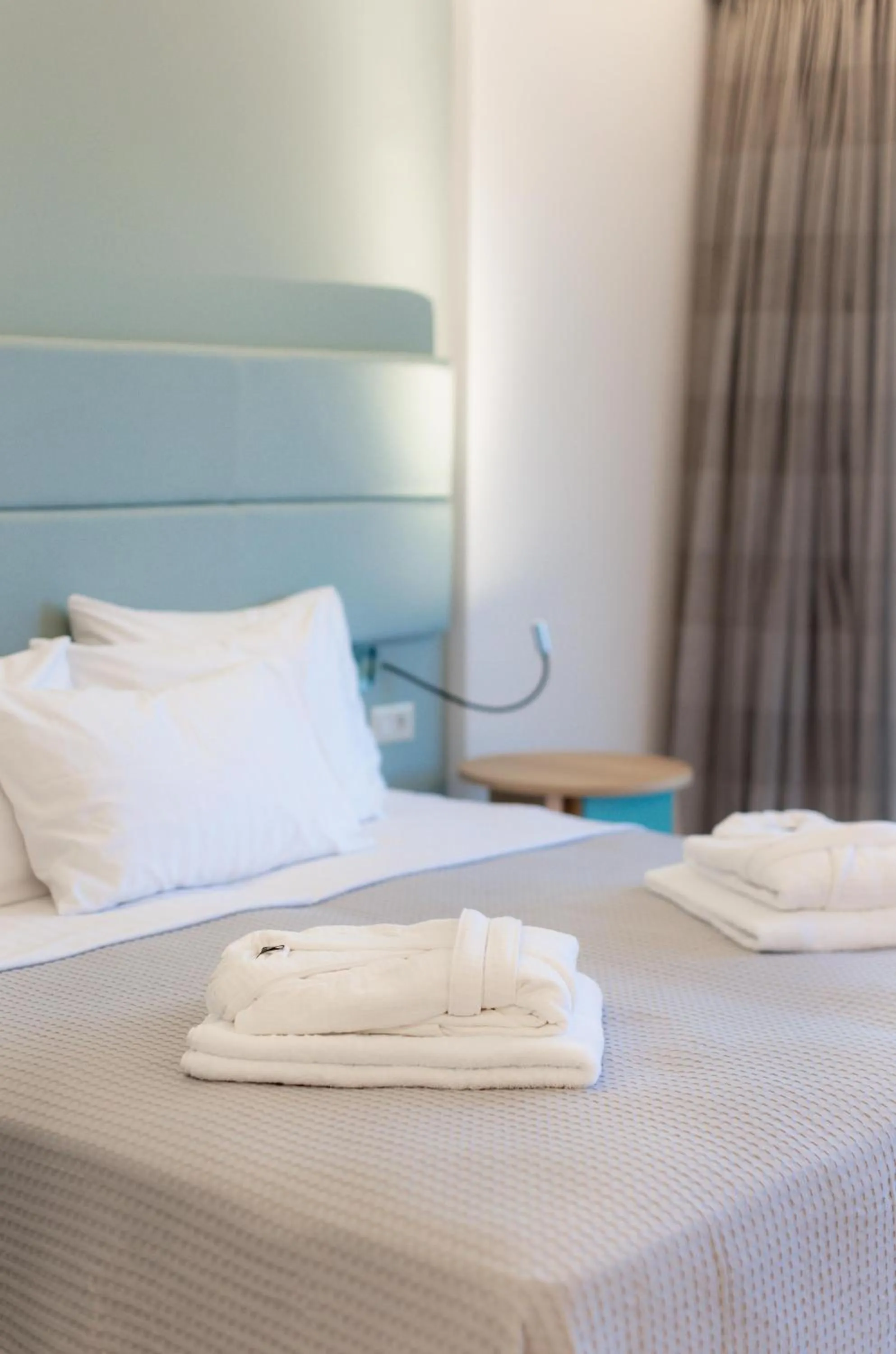 Bed in Palacio del Sol Luxury Apartments