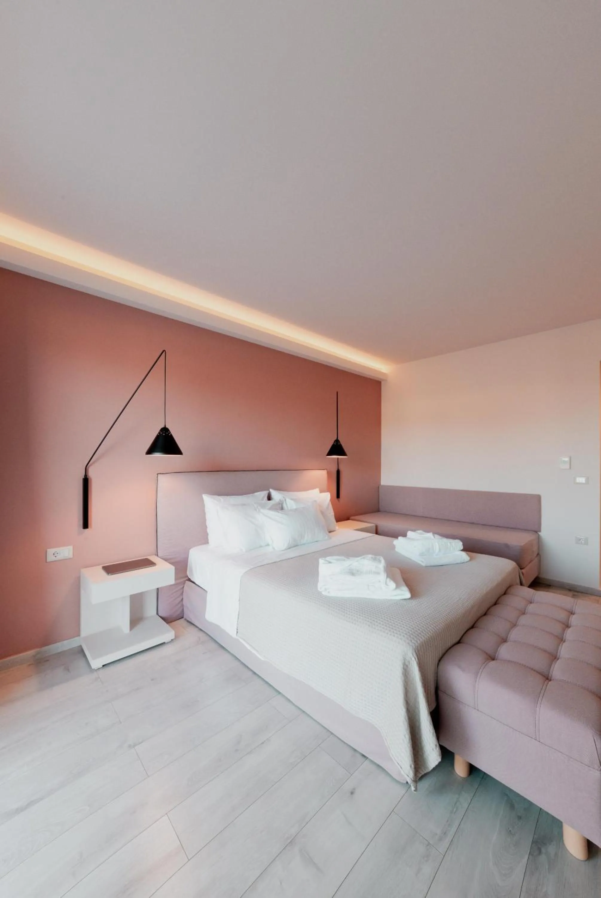 Bed in Palacio del Sol Luxury Apartments