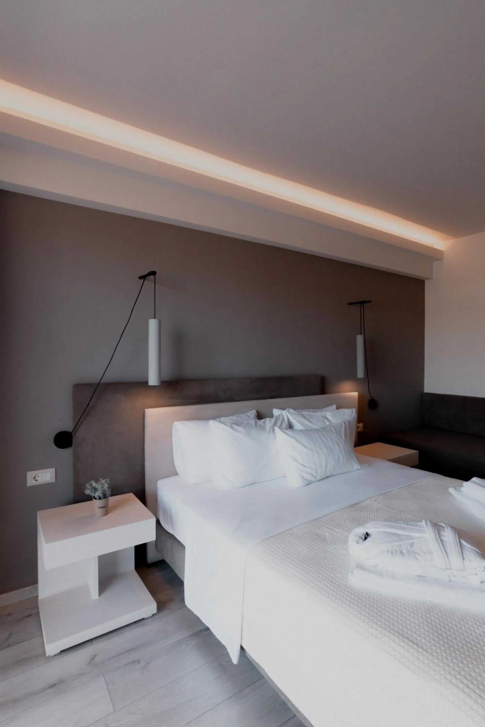 Bed in Palacio del Sol Luxury Apartments