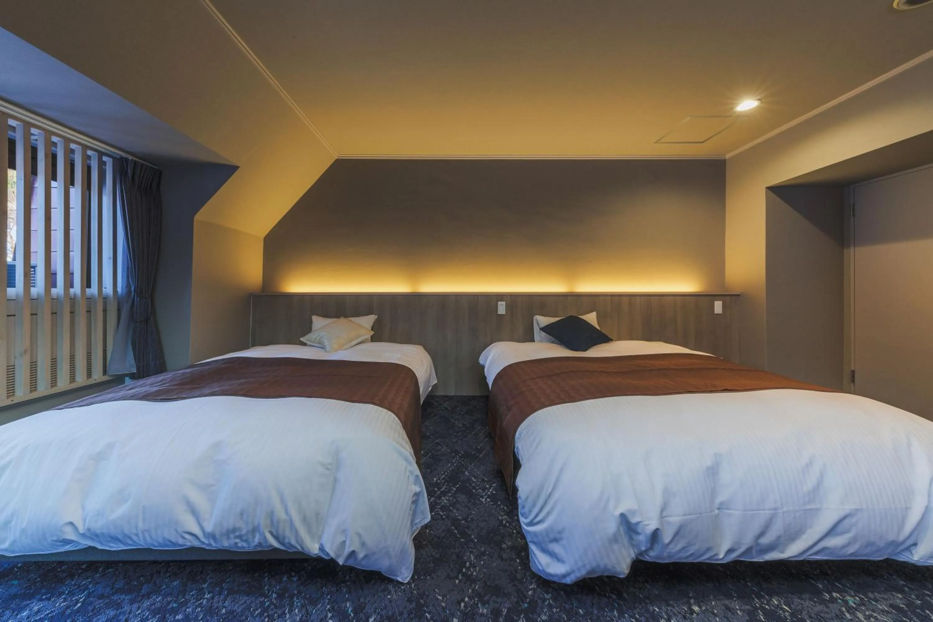 Bed in Takamiya Hotel Jurin