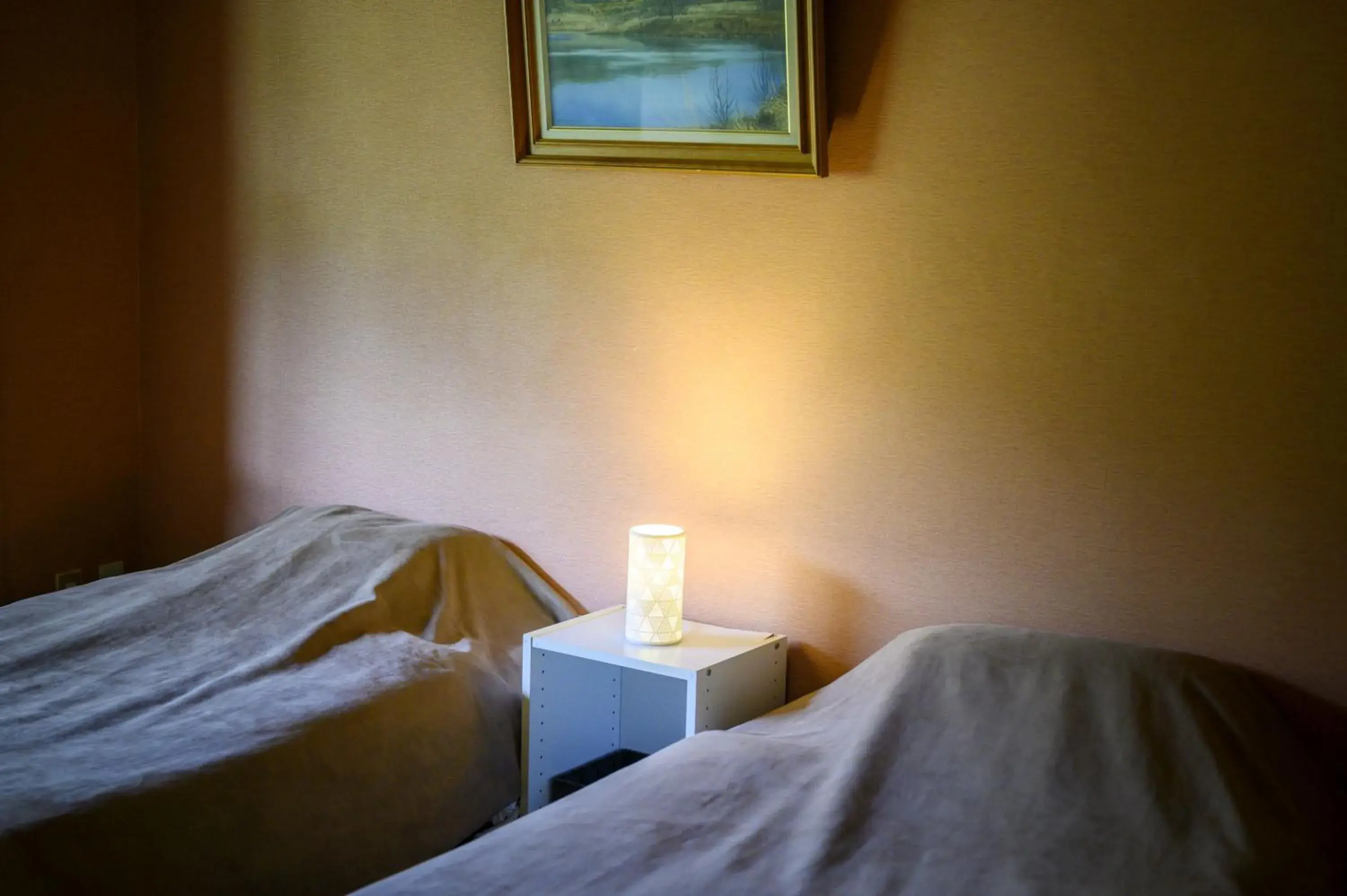 Bed in Takamiya Hotel Jurin Bed in Takamiya Hotel Jurin