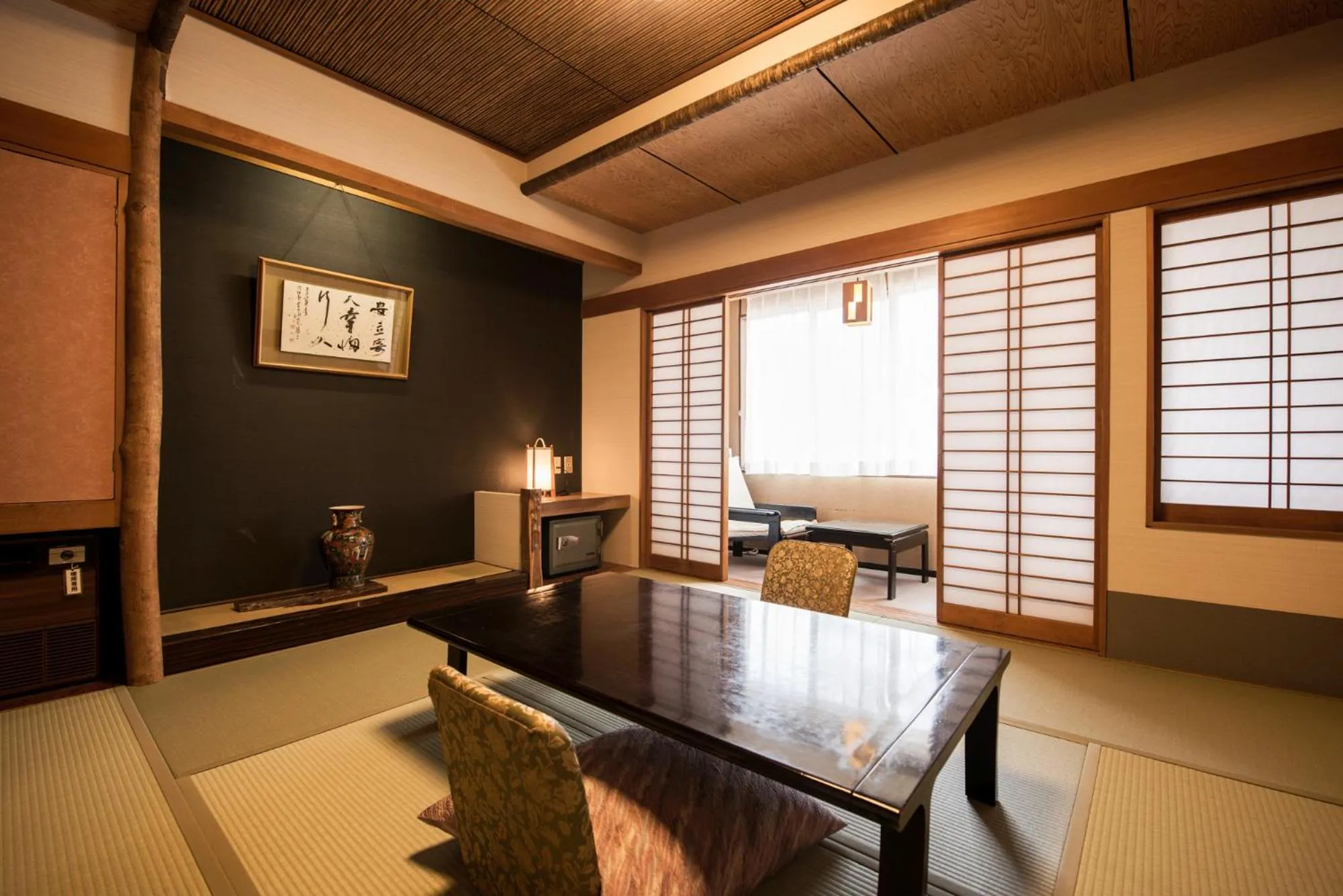 Bed in Takamiya Ryokan Miyamaso