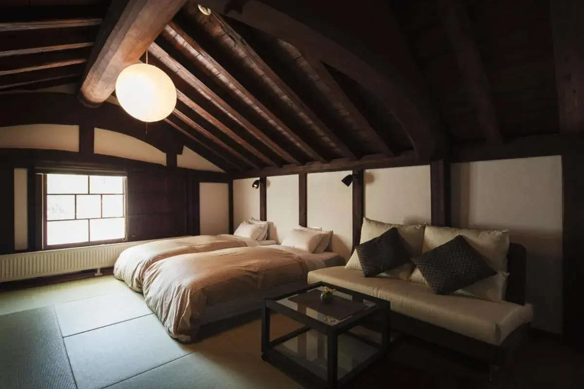 Bed in Takamiya Ryokan Miyamaso Bed in Takamiya Ryokan Miyamaso