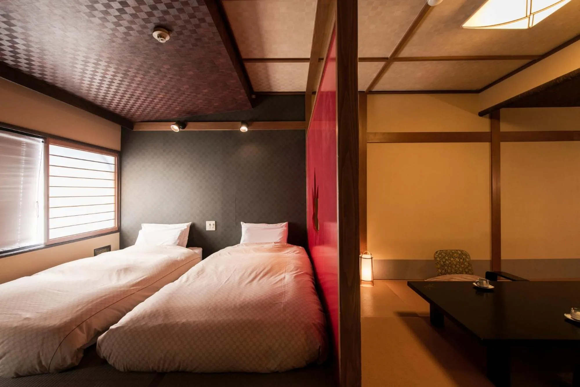 Bed in Takamiya Ryokan Miyamaso