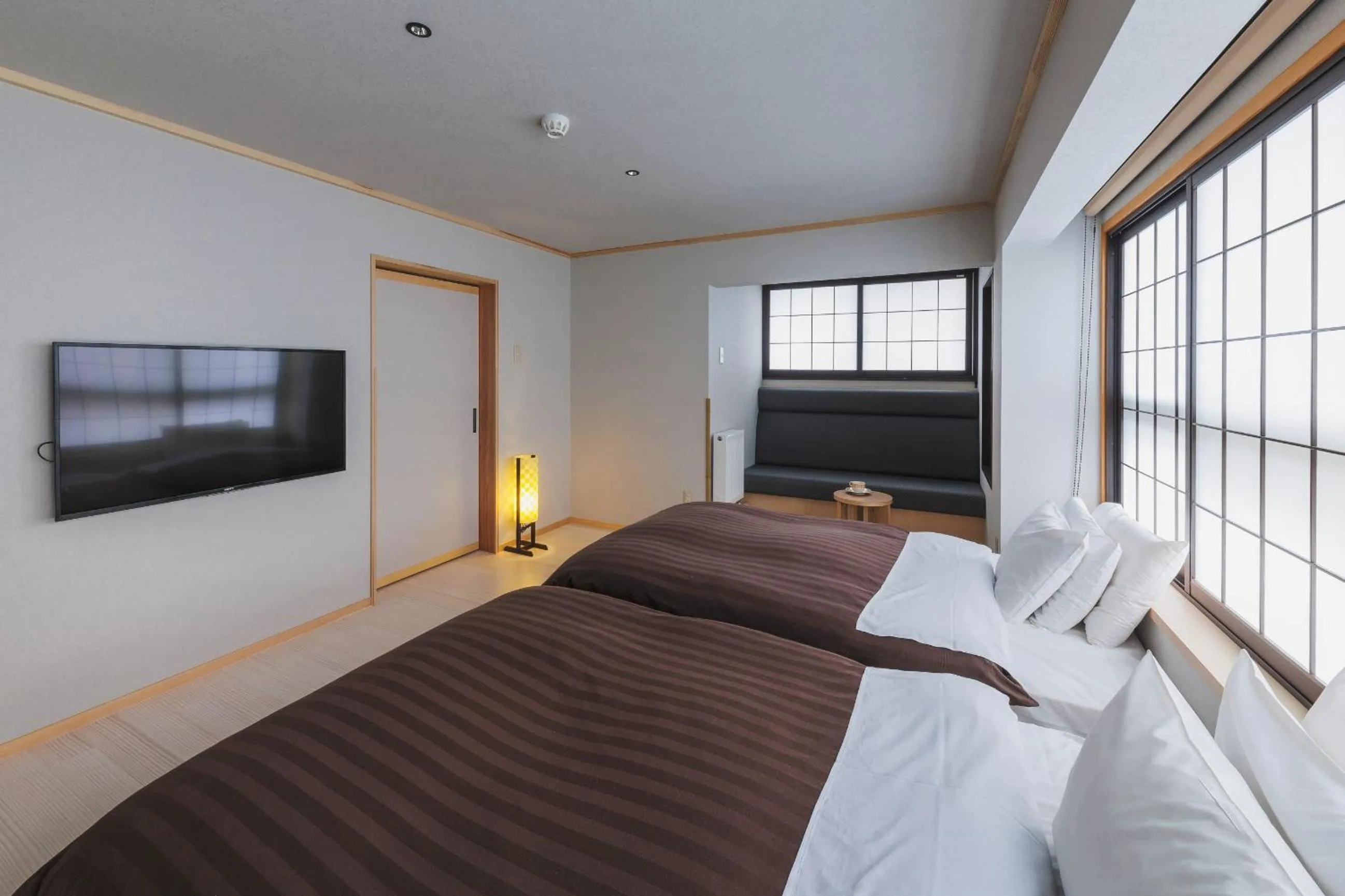 Bed in Takamiya Ryokan Miyamaso