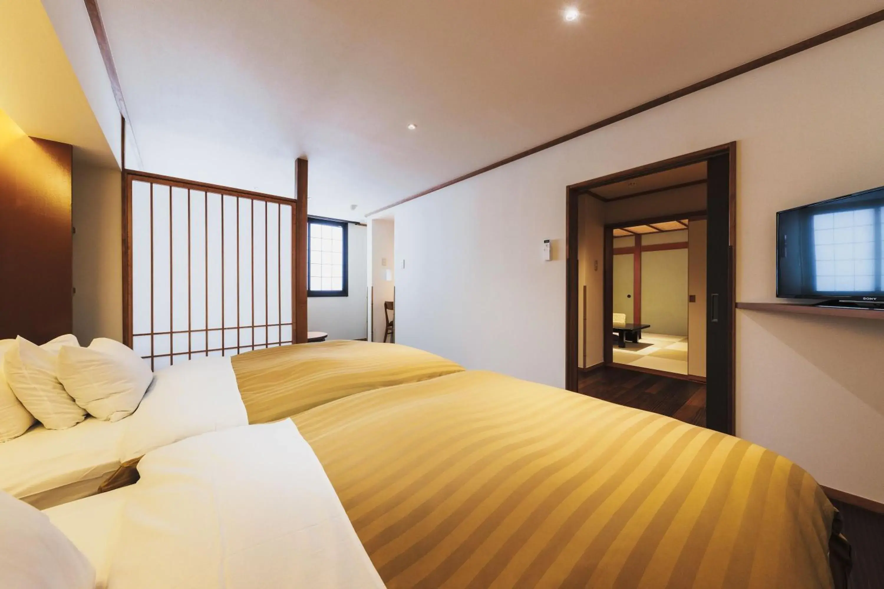 Bed in Takamiya Ryokan Miyamaso Bed in Takamiya Ryokan Miyamaso