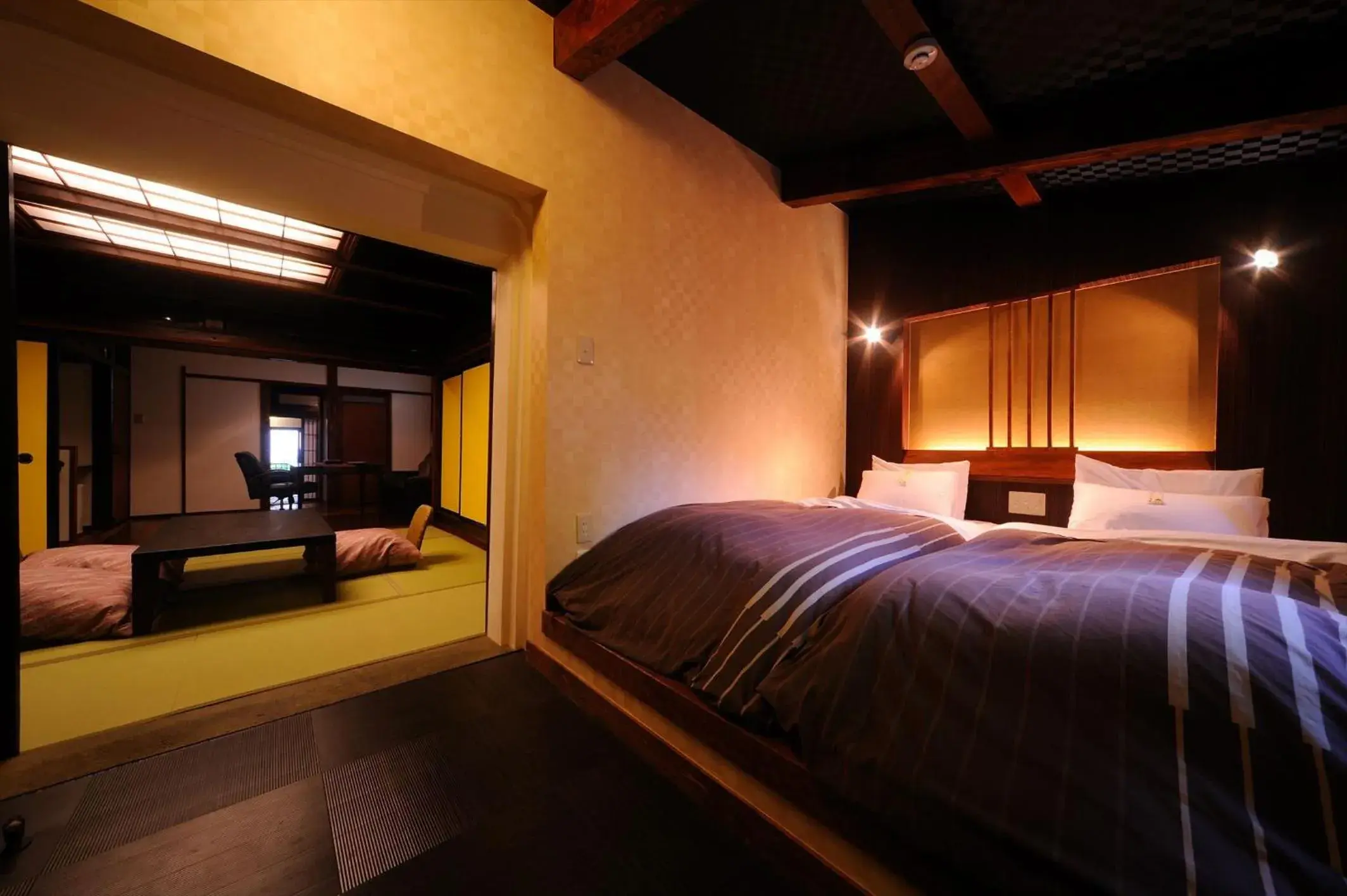 Bed in Takamiya Ryokan Miyamaso Bed in Takamiya Ryokan Miyamaso