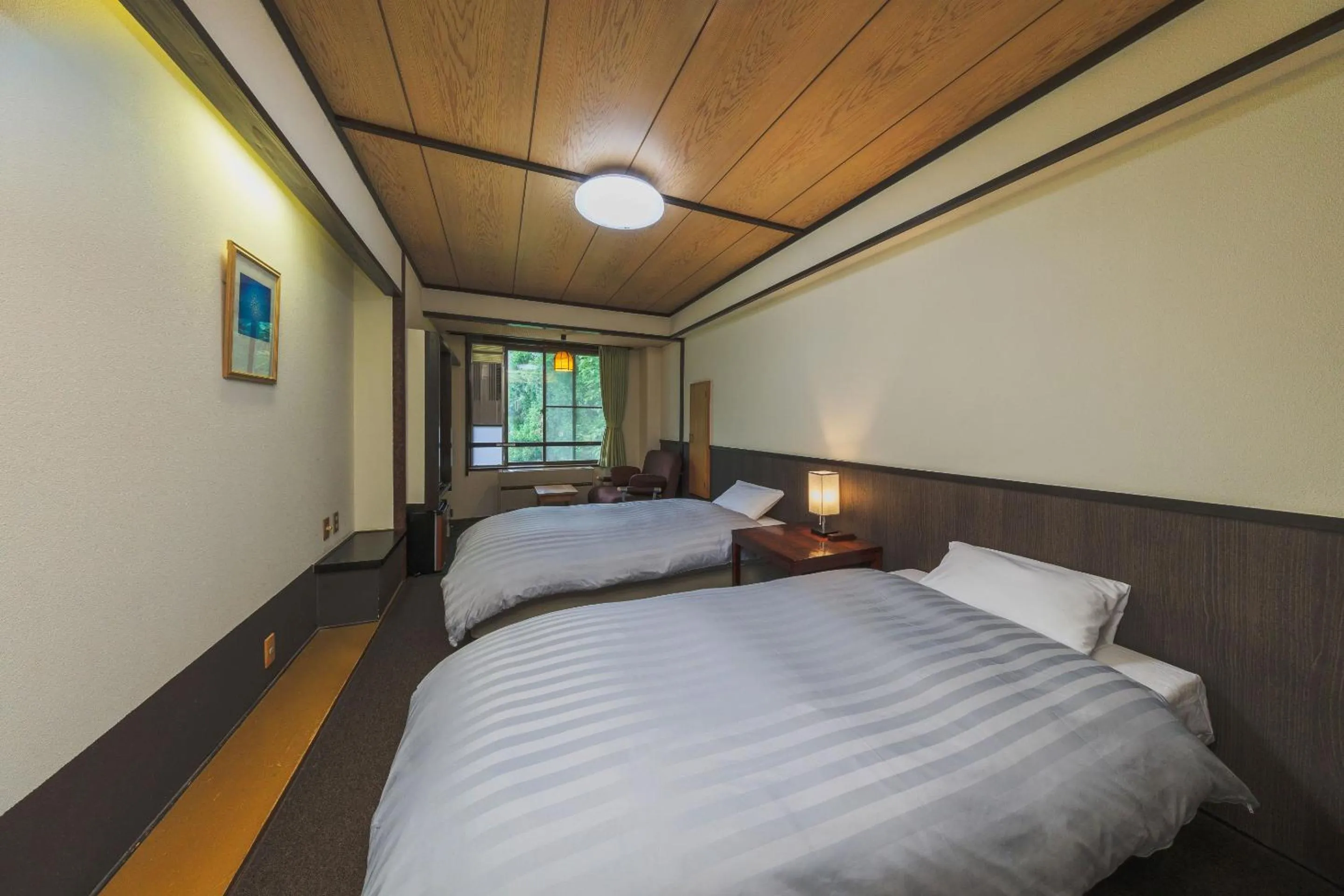 Bed in Takamiya Hotel Hammond