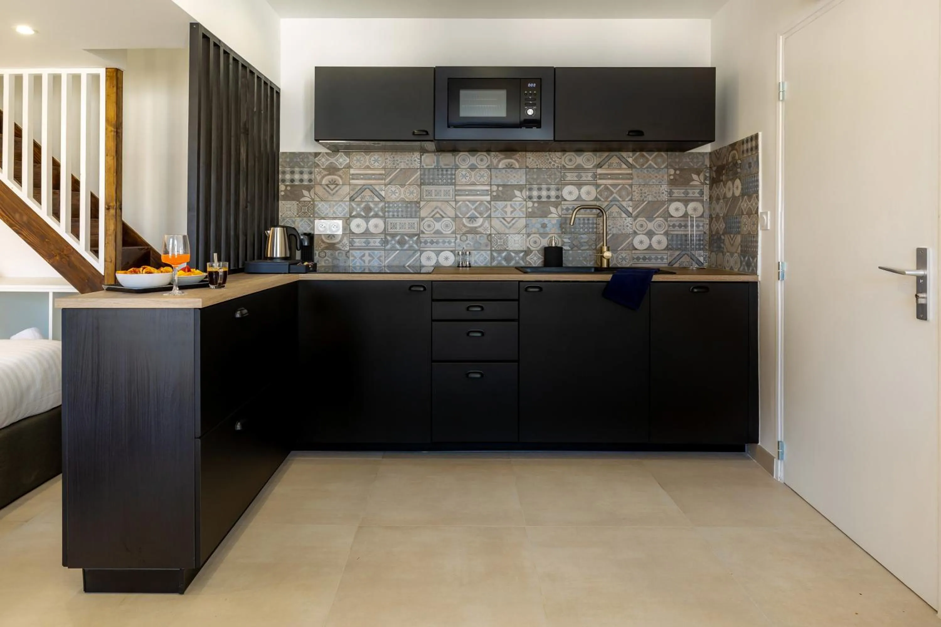 Kitchen or kitchenette in Provence Au Coeur Appart Hotels