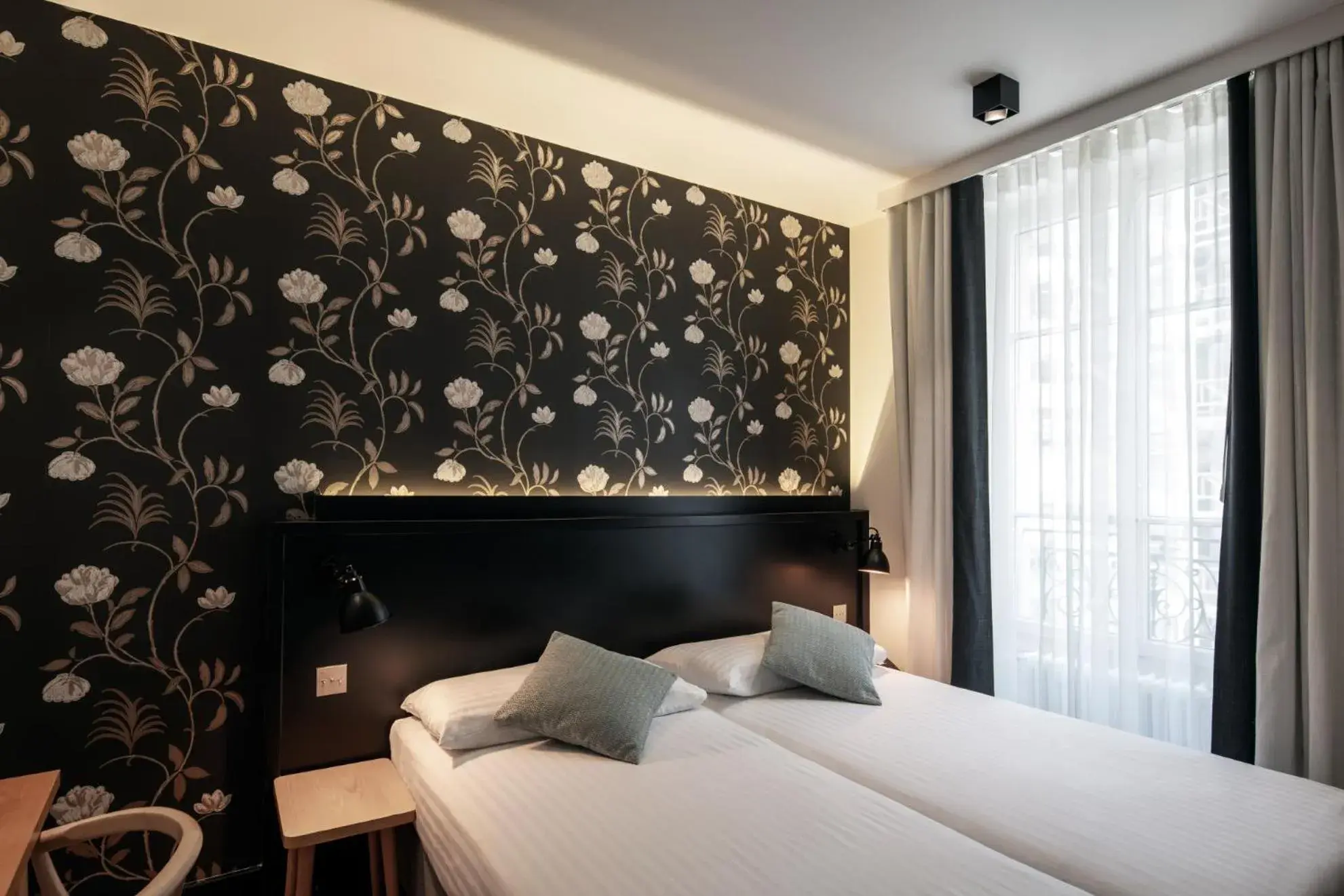 Bed in Hôtel Pax Bed in Hôtel Pax