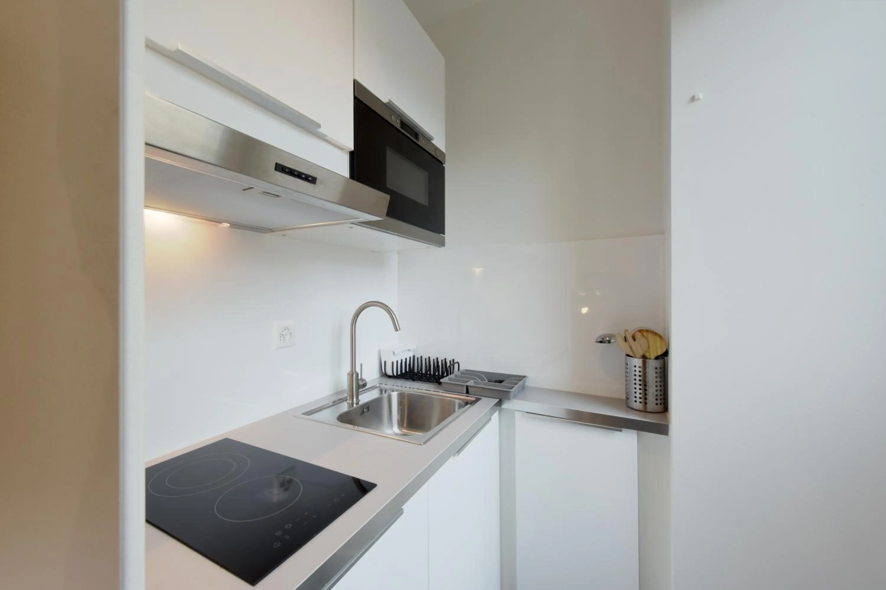 Kitchen or kitchenette in Hôtel Pax