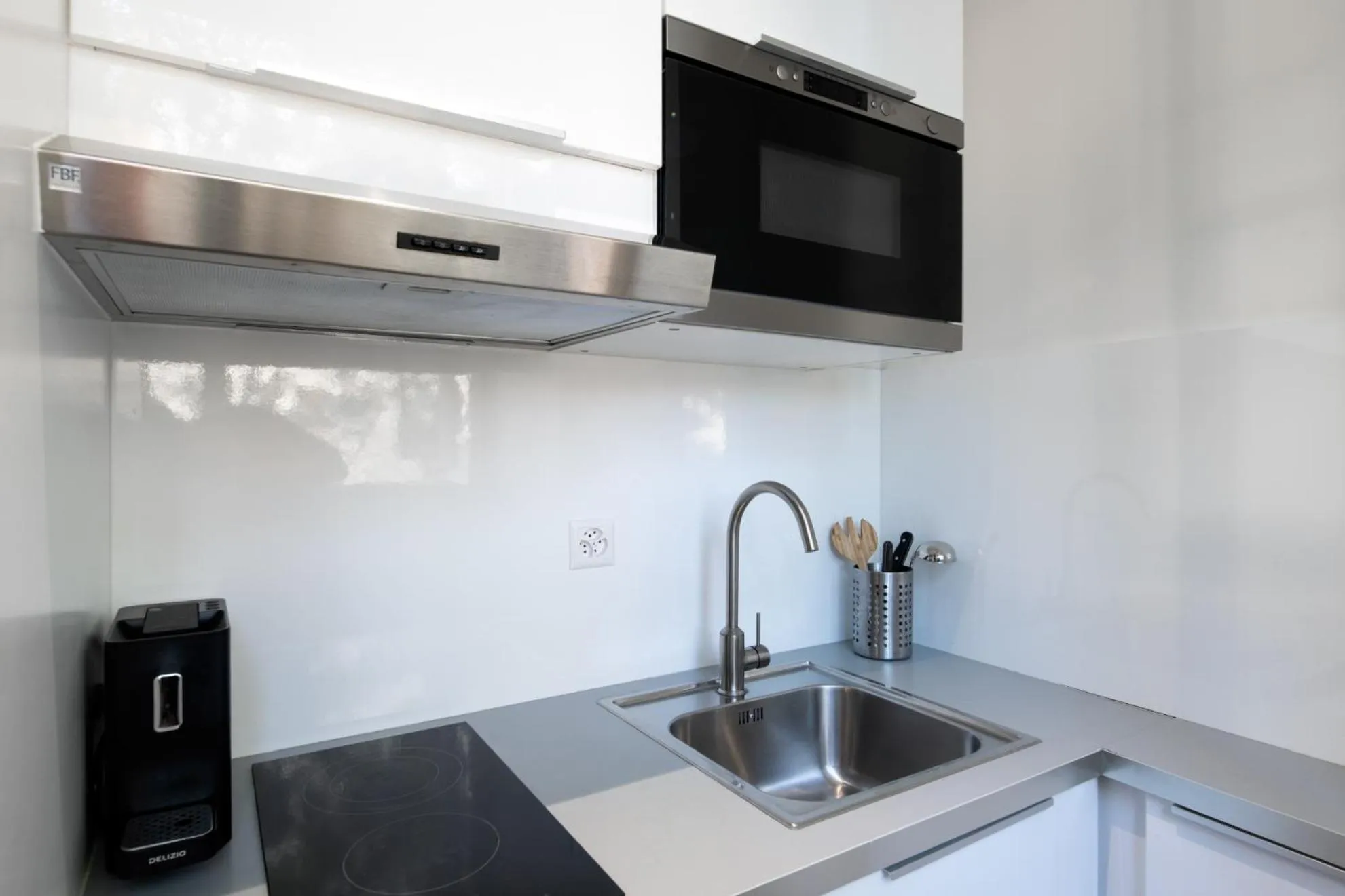 Kitchen or kitchenette in Hôtel Pax