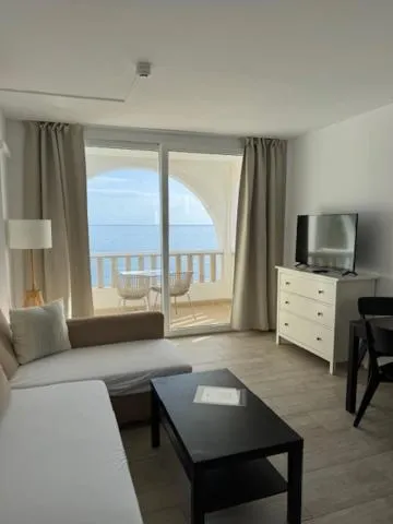 Living room, Bed in Orange Colom - Seaside Apartments