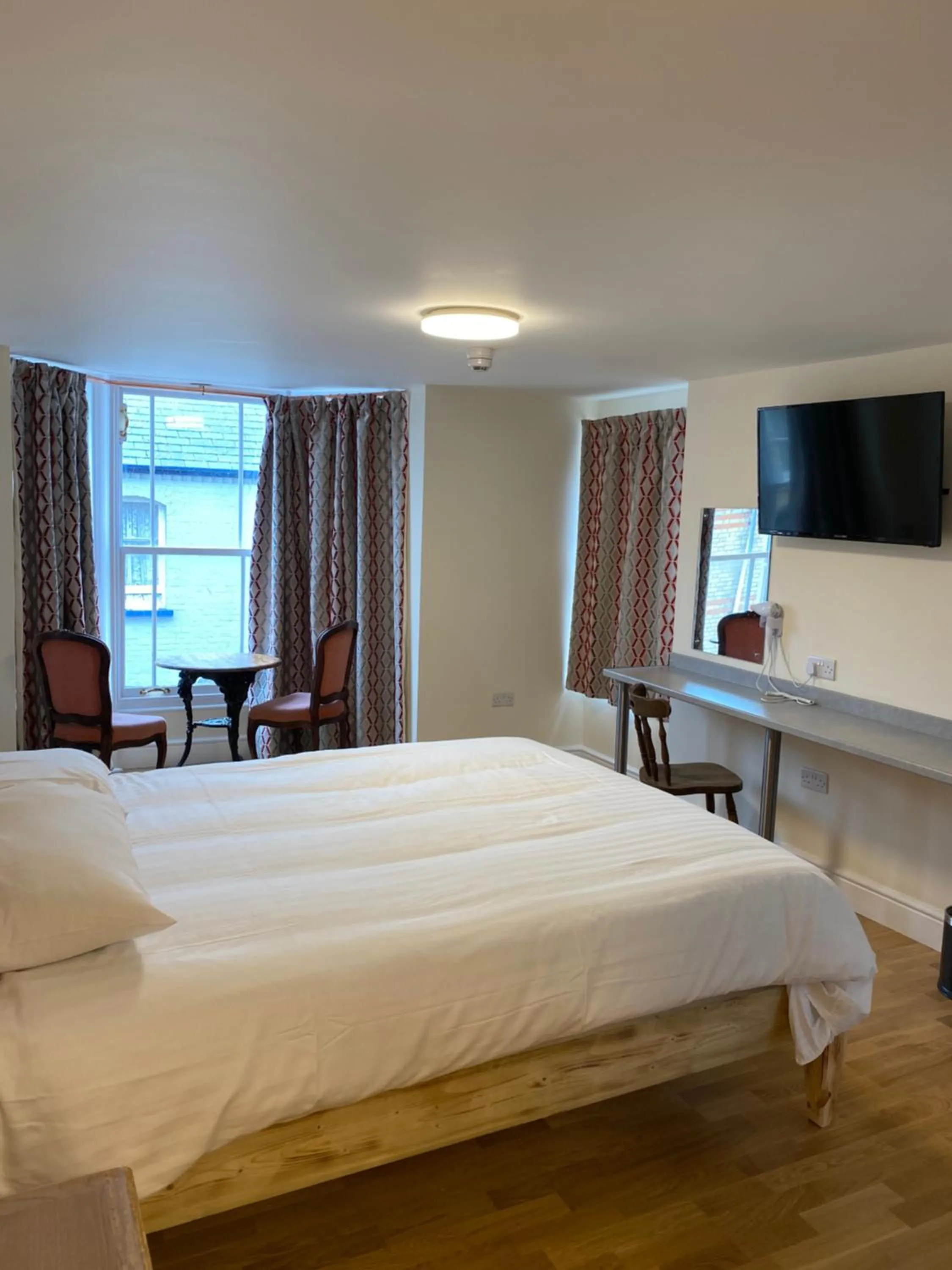 Bed in The Grand Harbour hotel