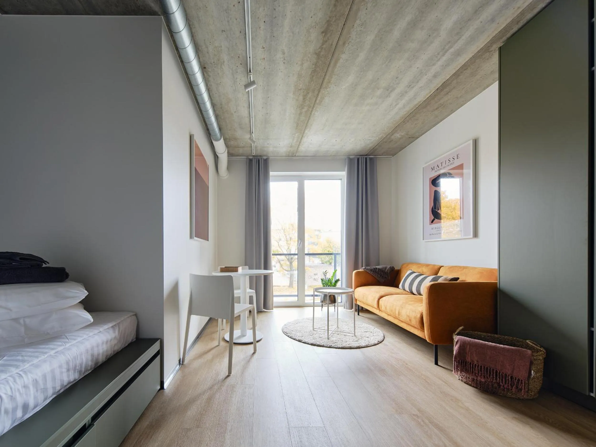 Bed in Campus House by Larsen