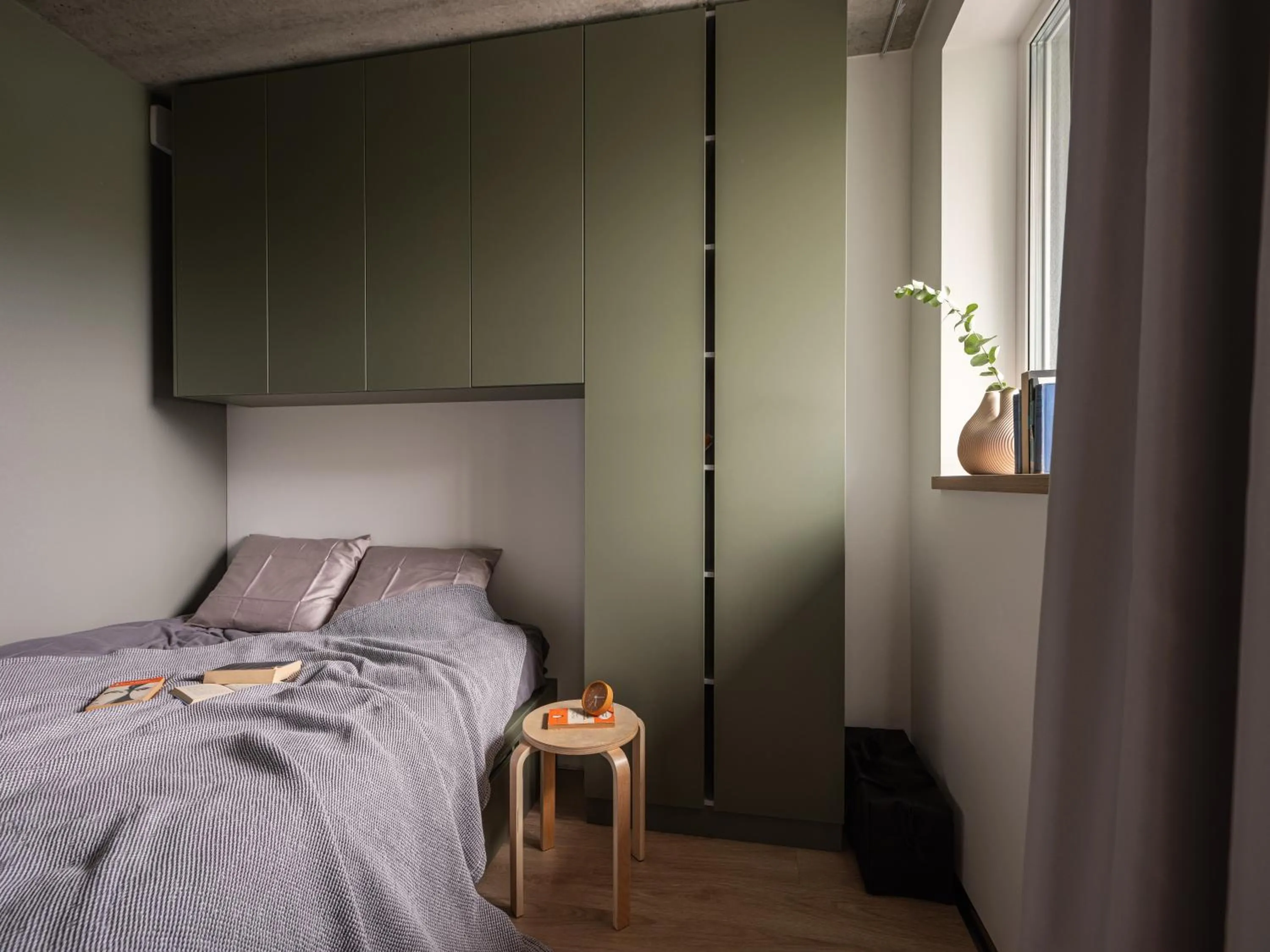 Bed in Campus House by Larsen