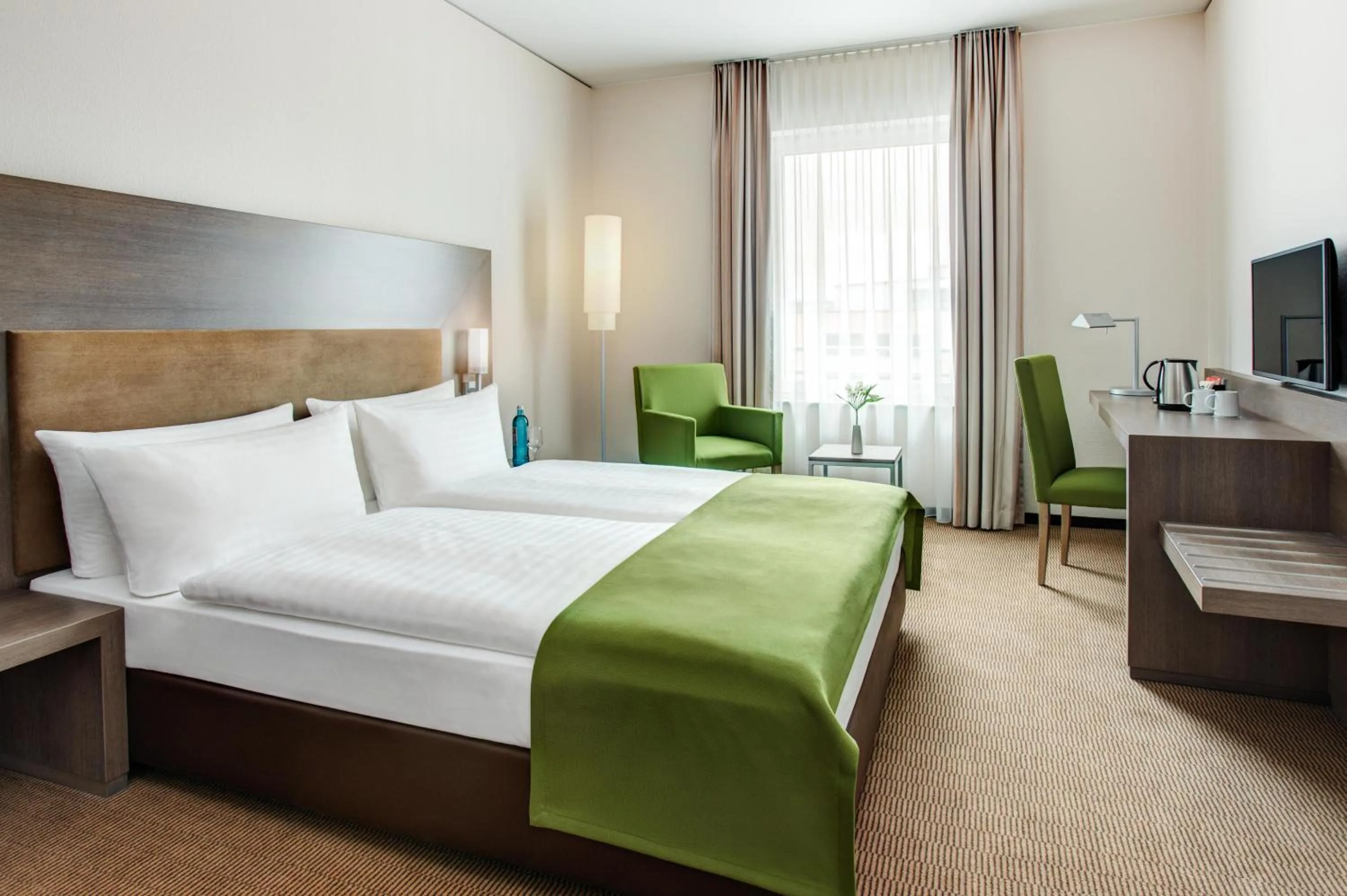 Photo of the whole room, Bed in IntercityHotel Mainz