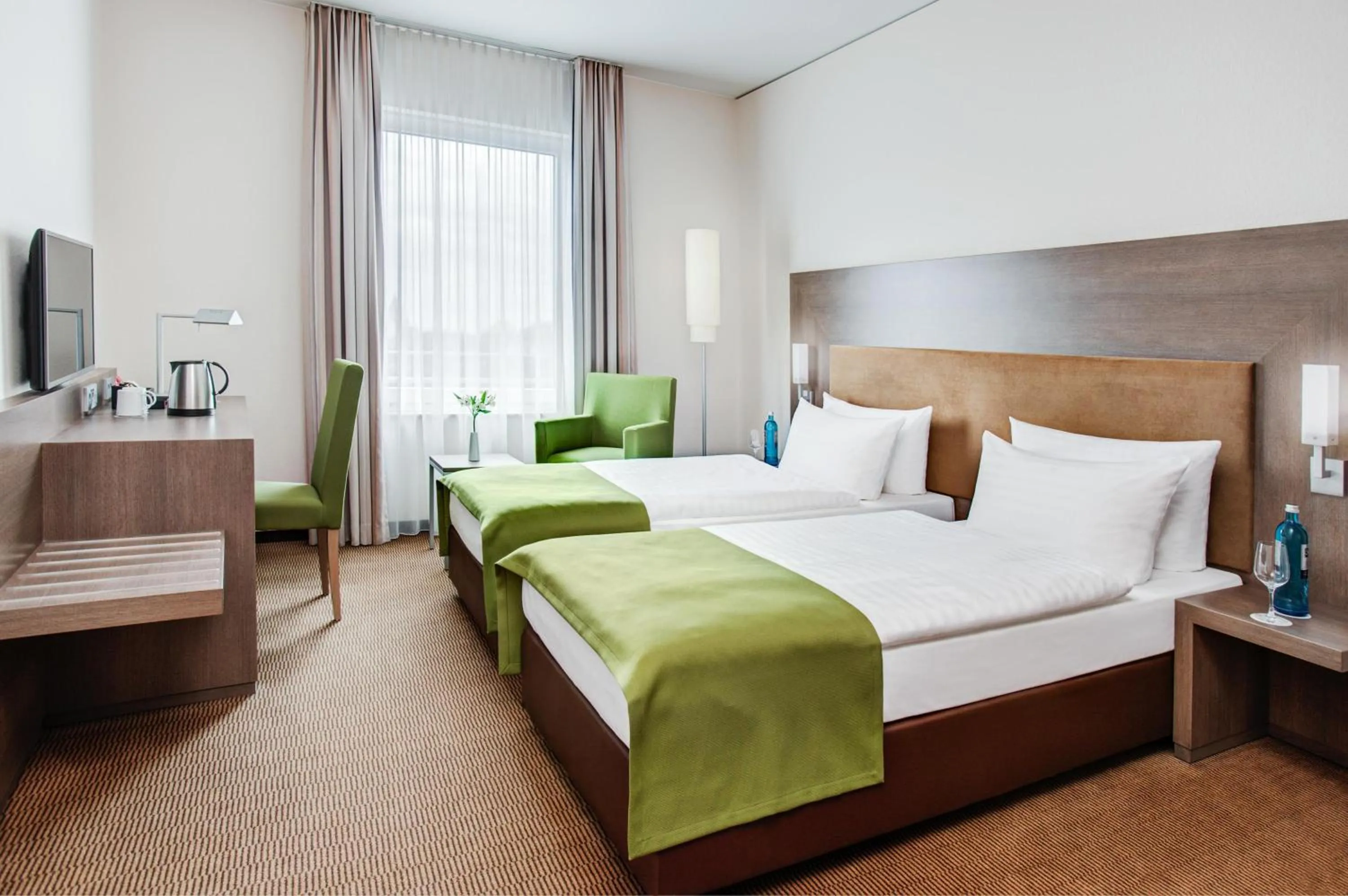 Photo of the whole room, Bed in IntercityHotel Mainz