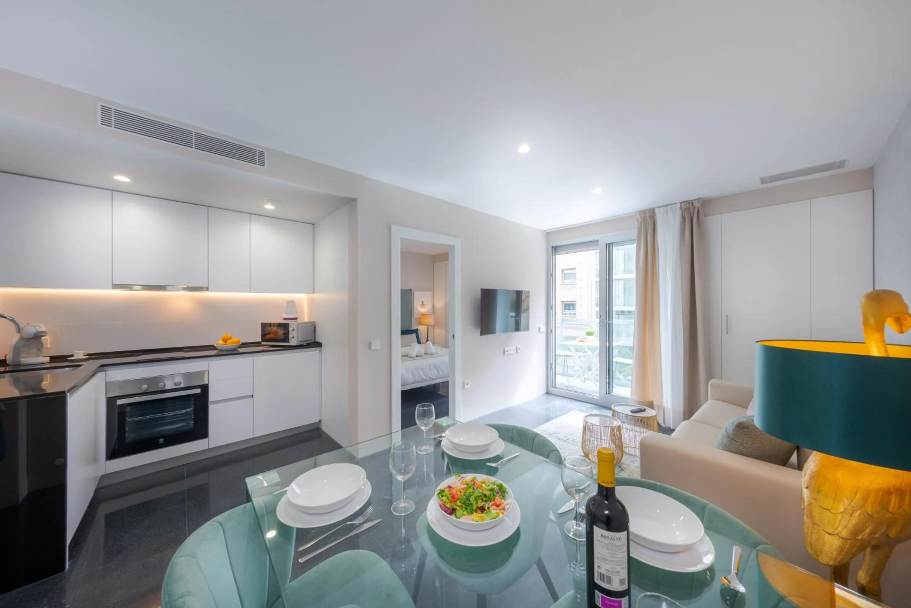 Kitchen or kitchenette in Holihome Rambla 24
