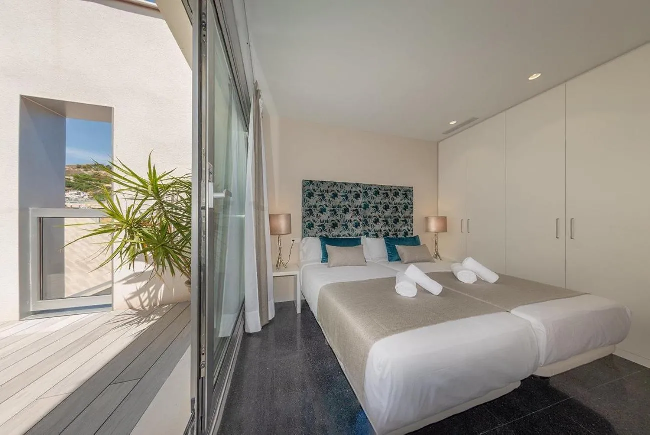 Bed in Holihome Rambla 24