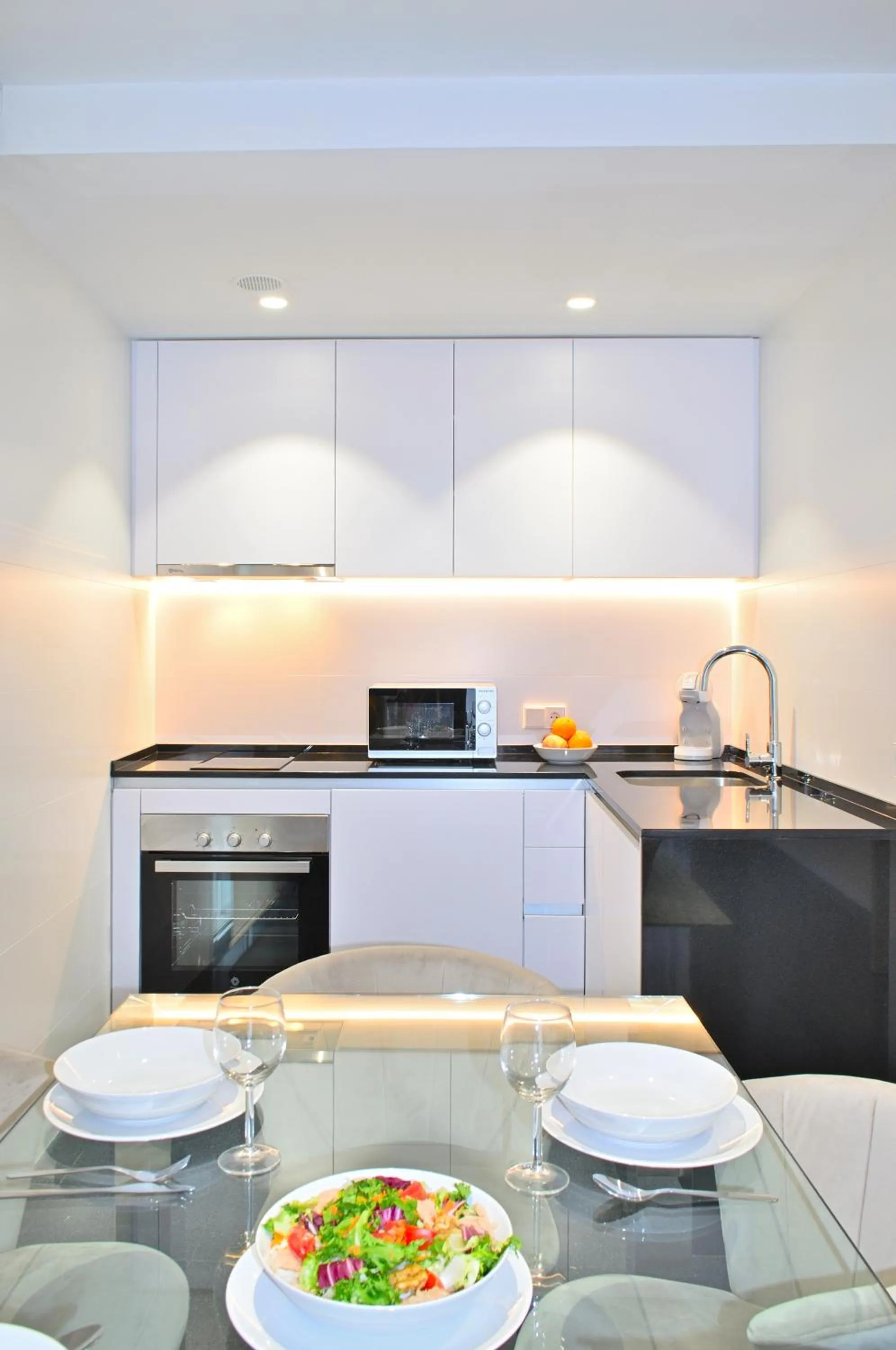Kitchen or kitchenette in Holihome Rambla 24