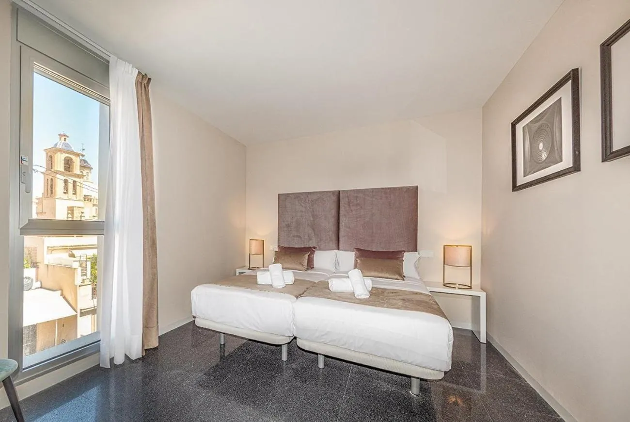 Bed in Holihome Rambla 24
