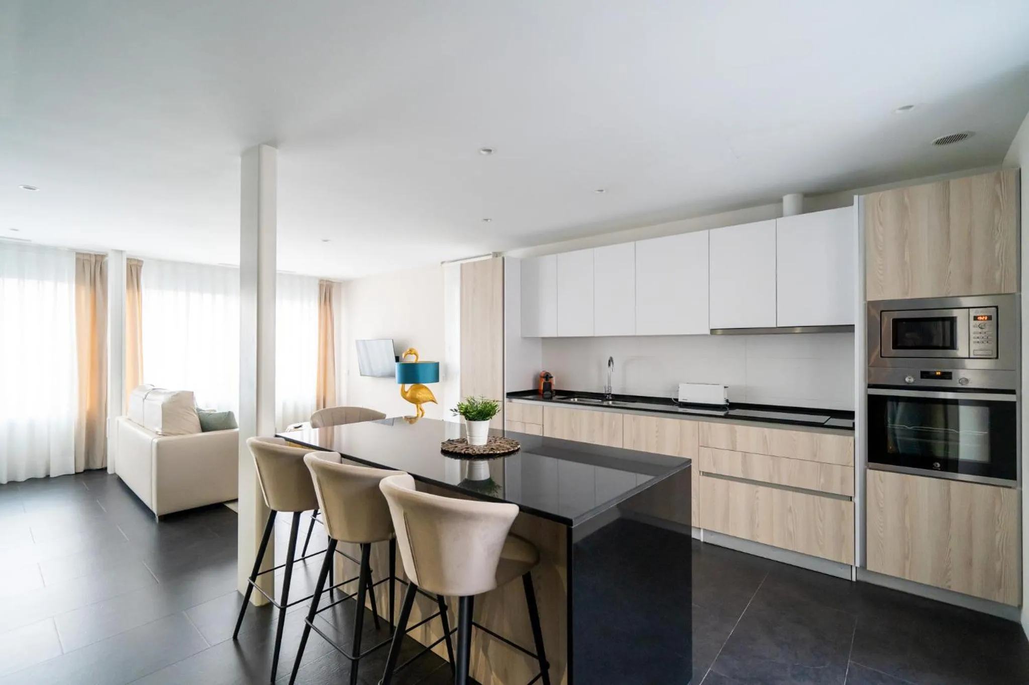 Kitchen or kitchenette in Holihome Rambla 24