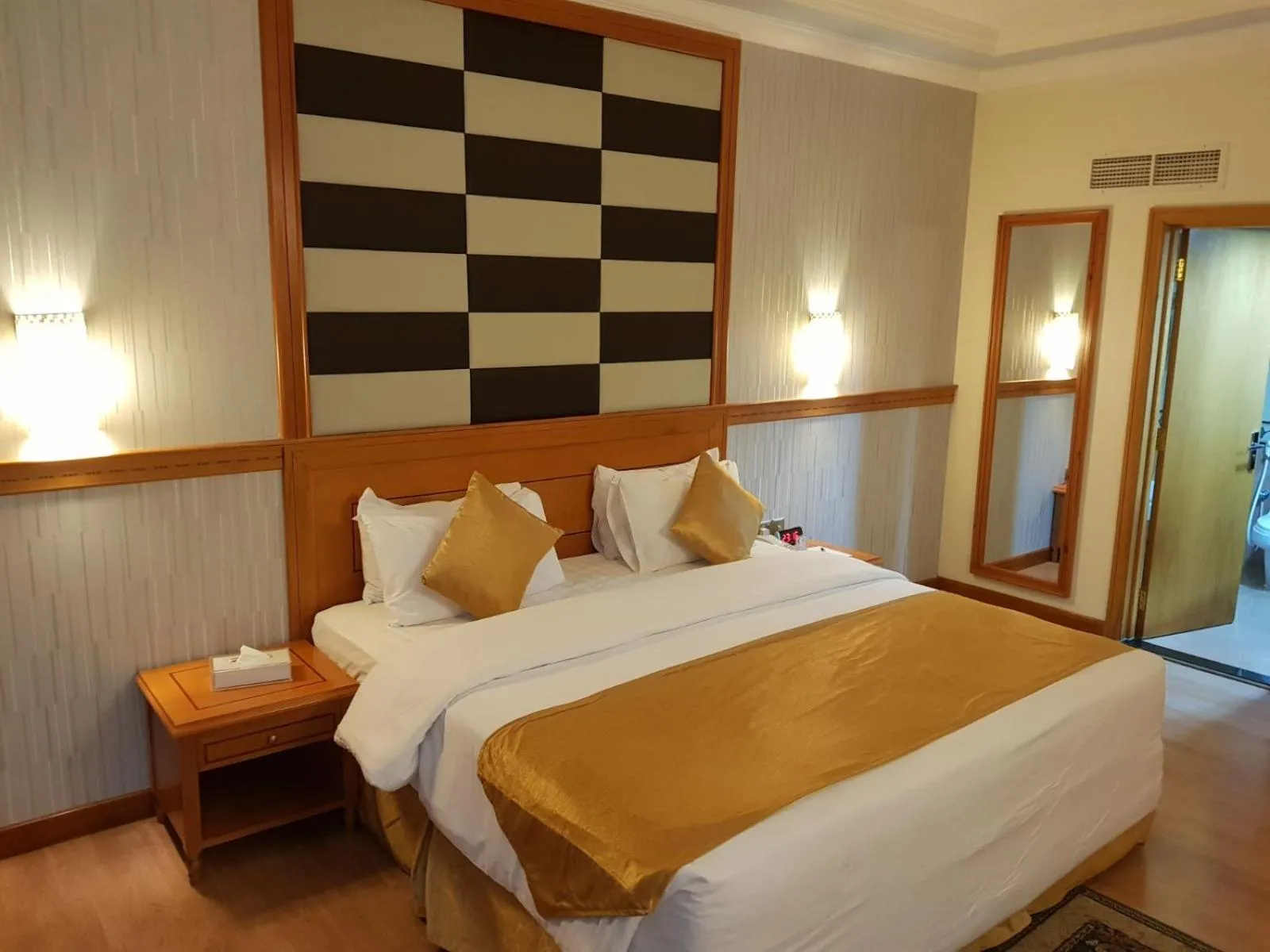 Bed in Swiss International Palace Hotel Manama