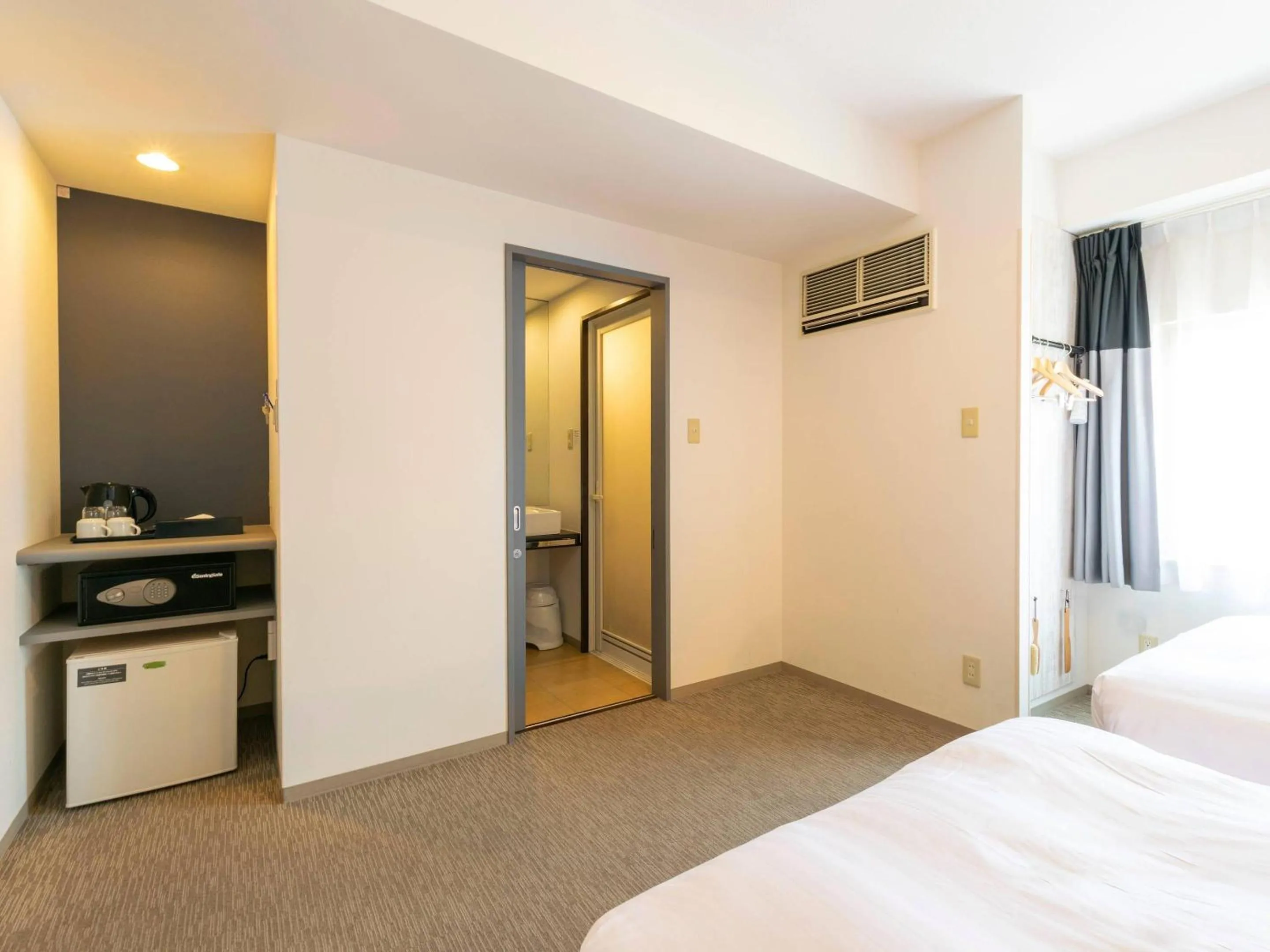 Bedroom, Bed in Comfort Inn Naha Tomari Port