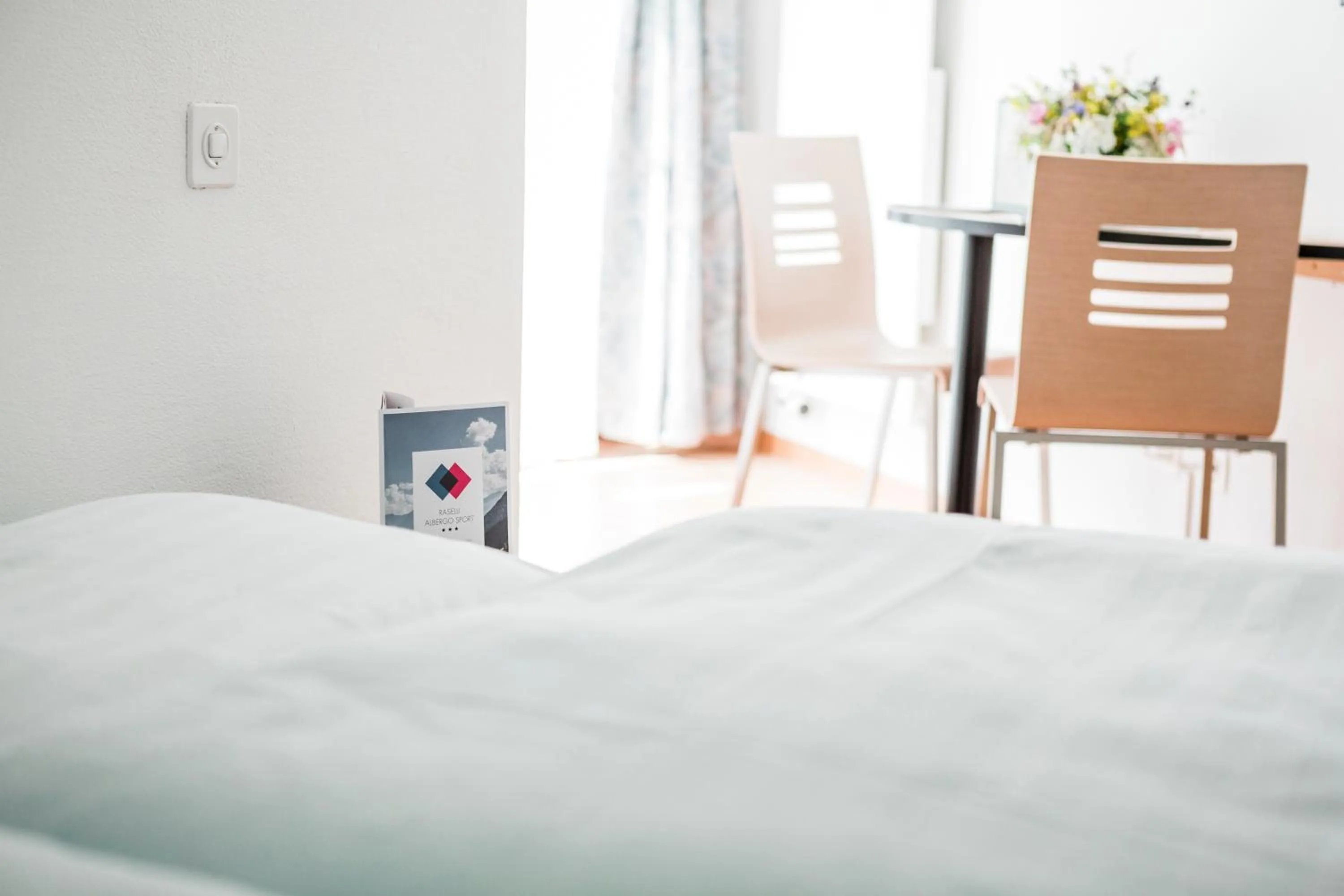 Bed in Raselli Sport Hotel