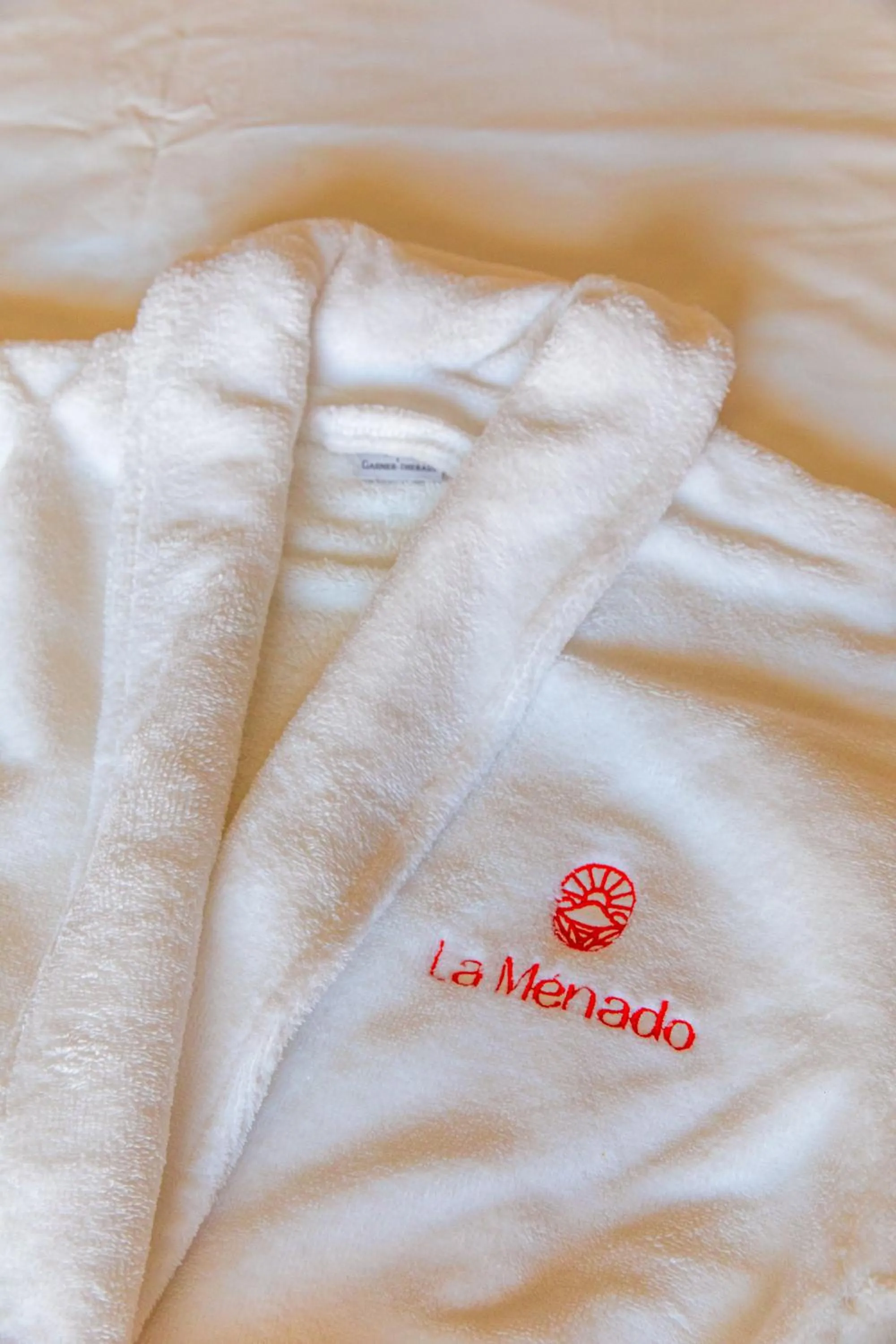 Bed in Hôtel La Ménado