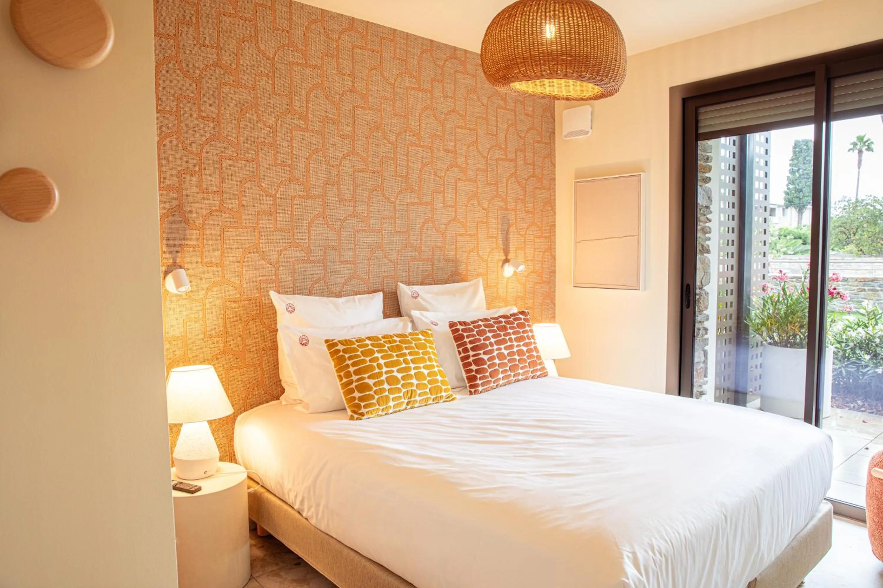 Bed in Hôtel La Ménado