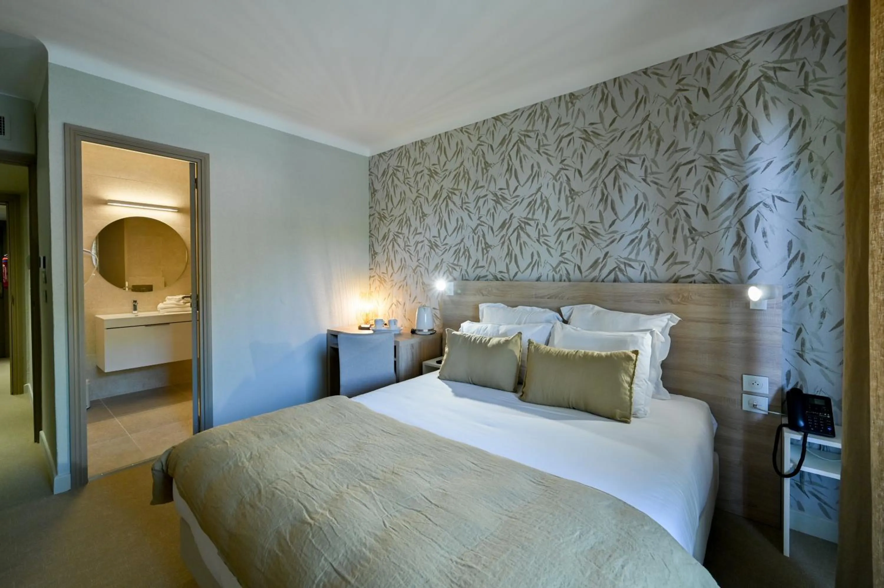 Bed in Hôtel La Ménado