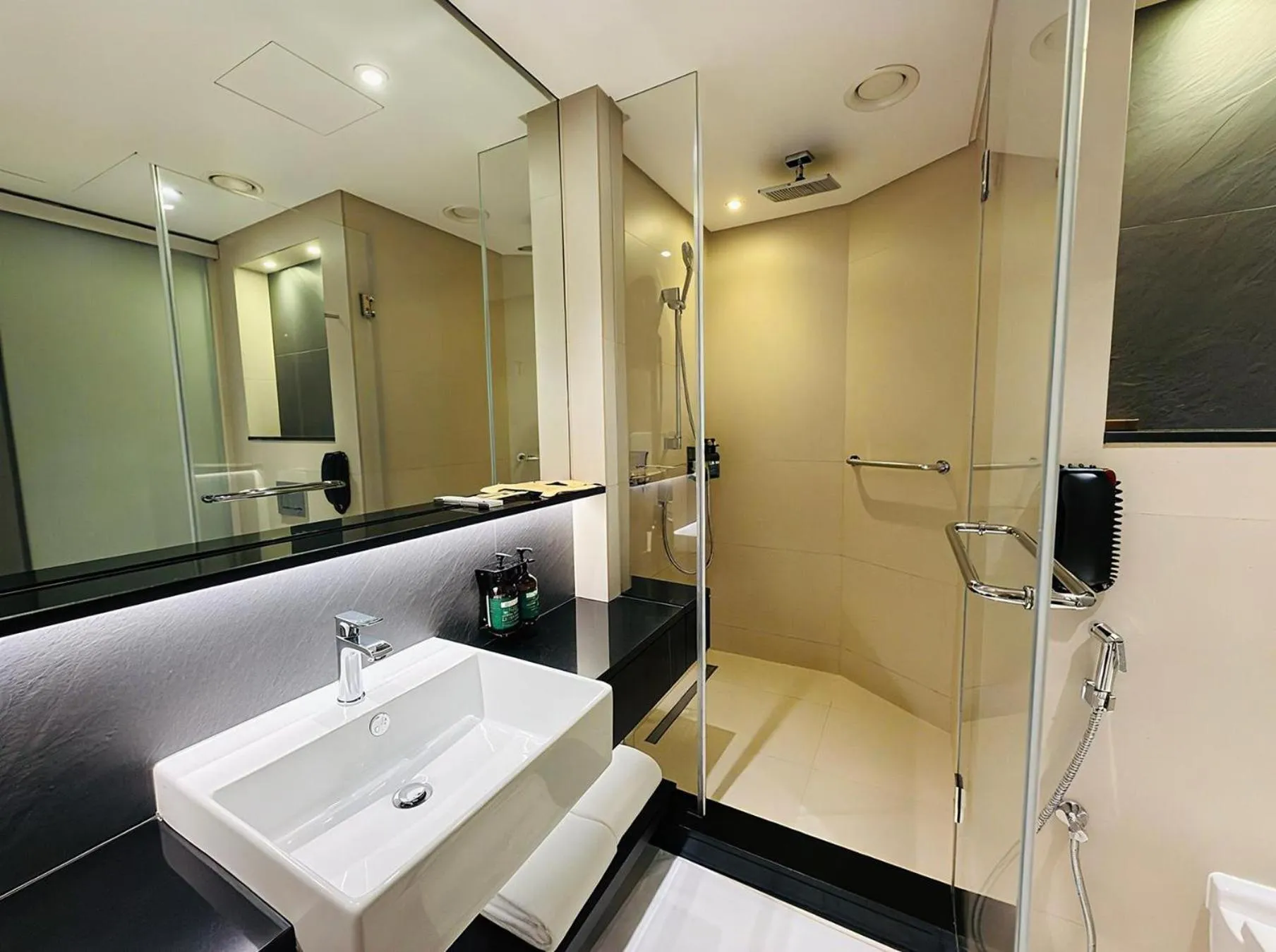 Bathroom in Crowne Plaza Bahrain by IHG