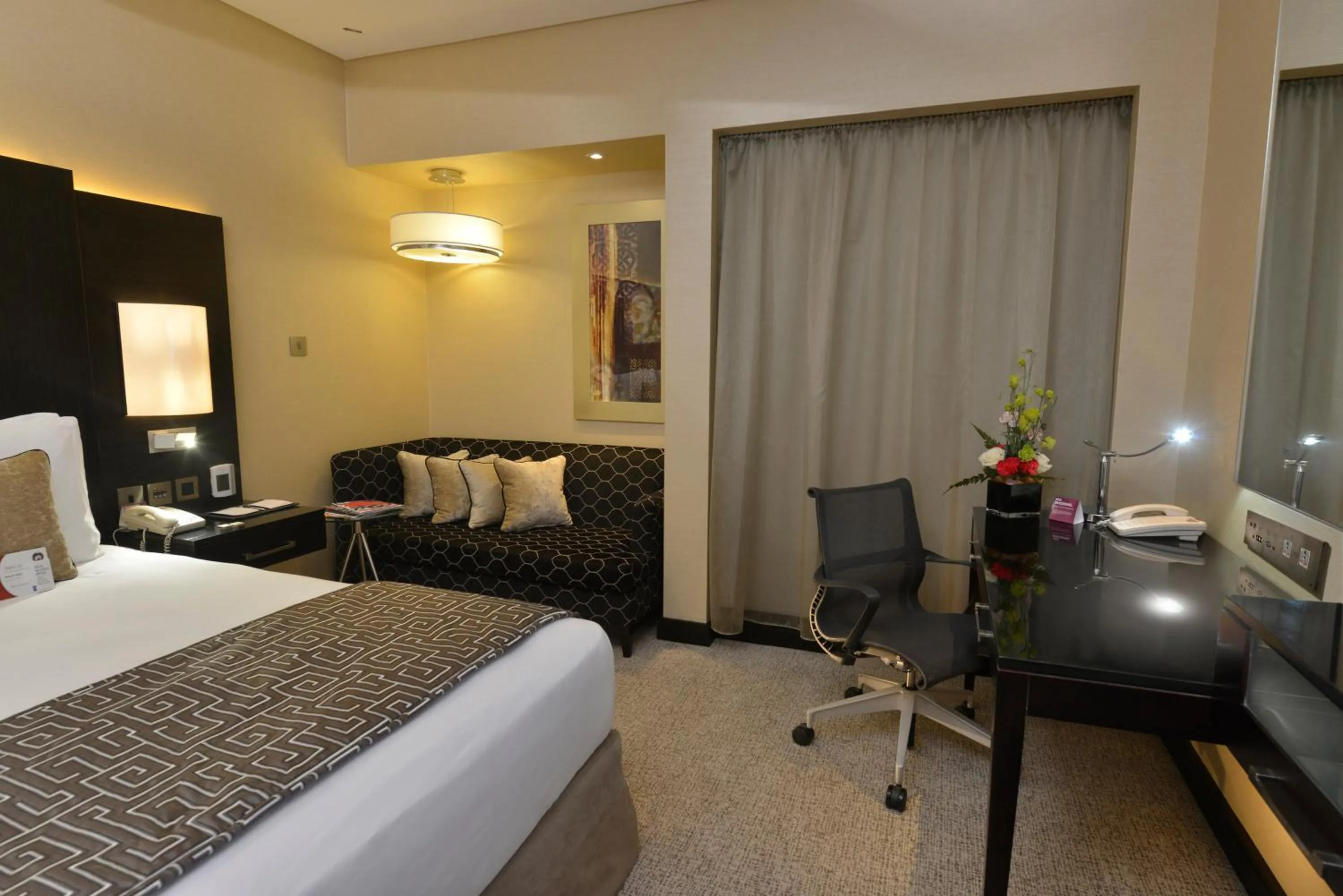 Photo of the whole room, Bed in Crowne Plaza Bahrain by IHG