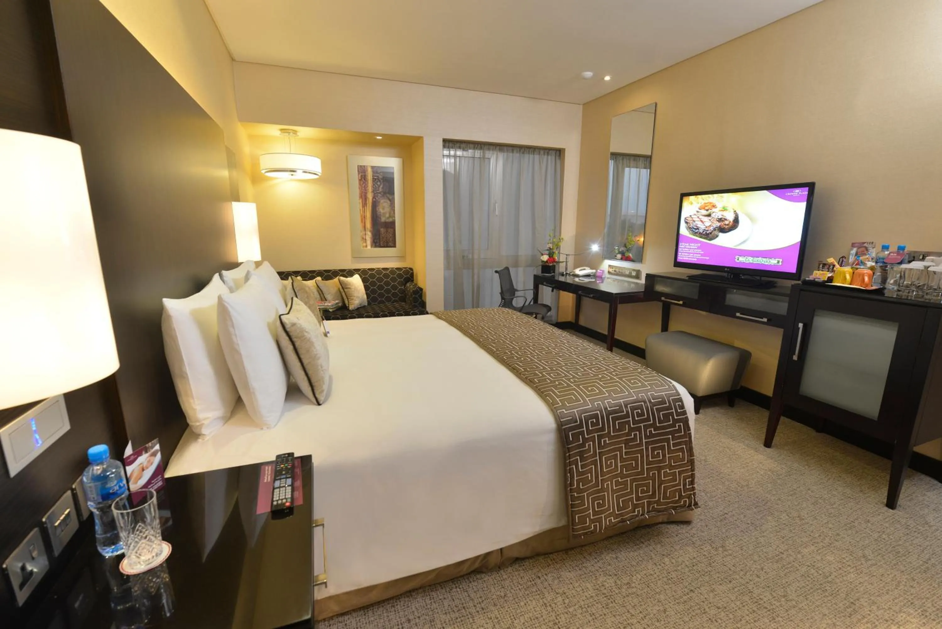 Photo of the whole room, Bed in Crowne Plaza Bahrain by IHG
