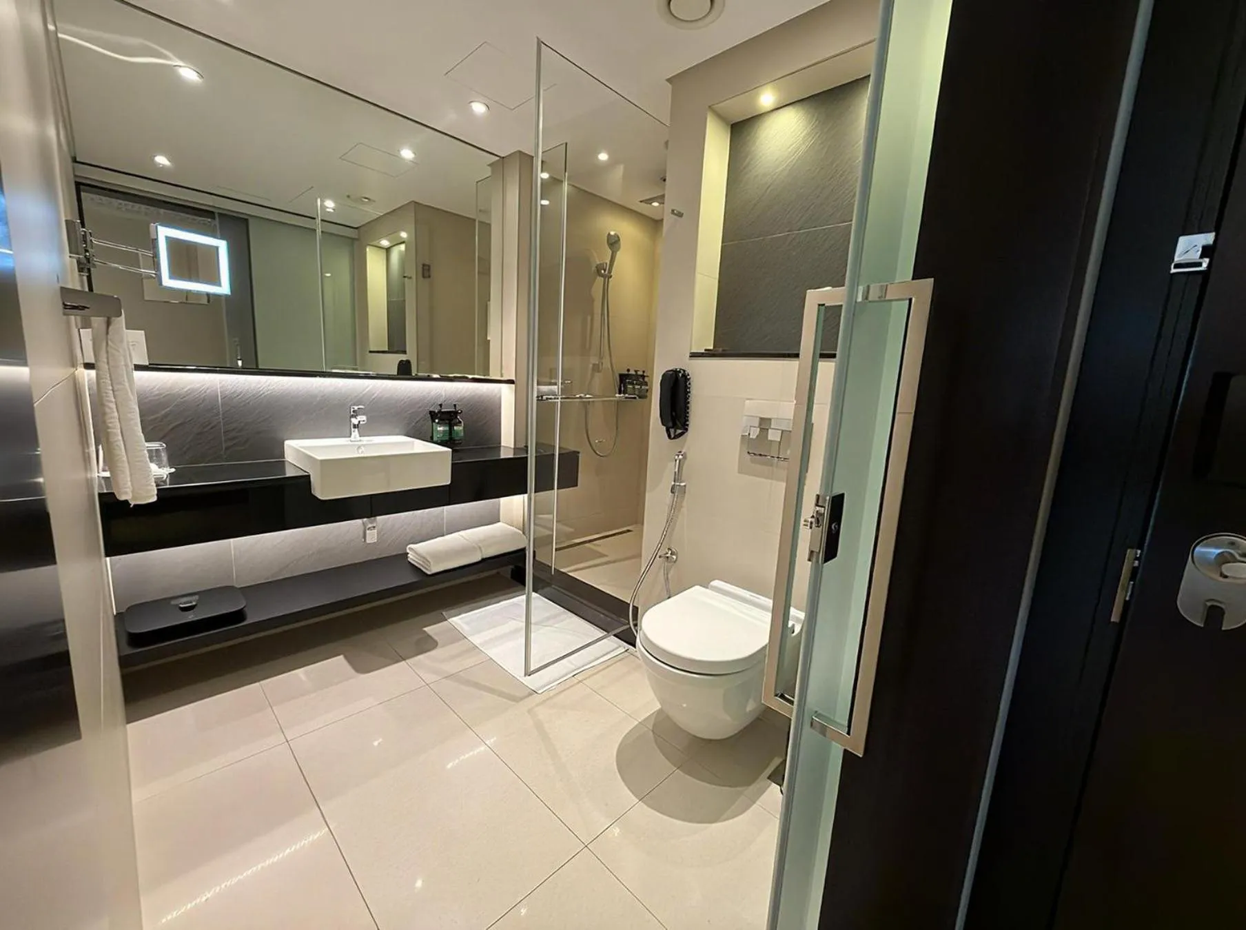 Bathroom in Crowne Plaza Bahrain by IHG