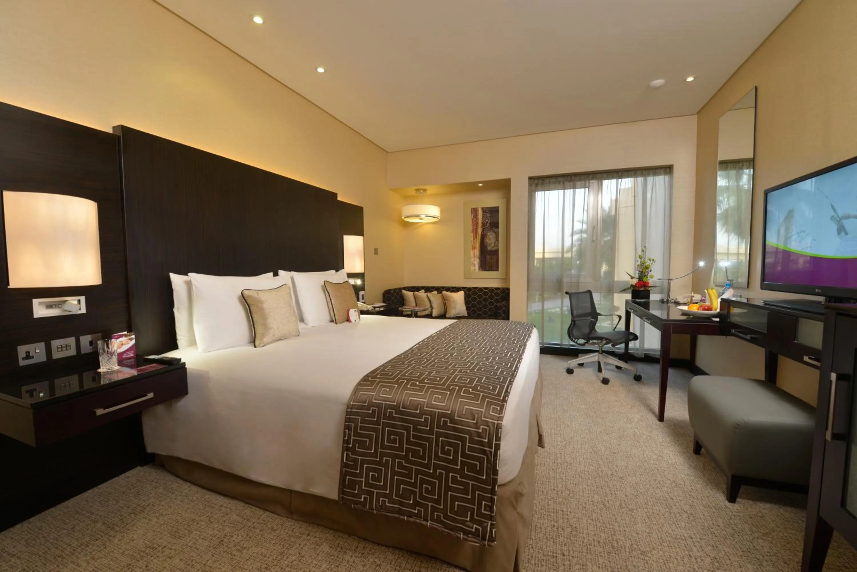 Photo of the whole room, Bed in Crowne Plaza Bahrain by IHG