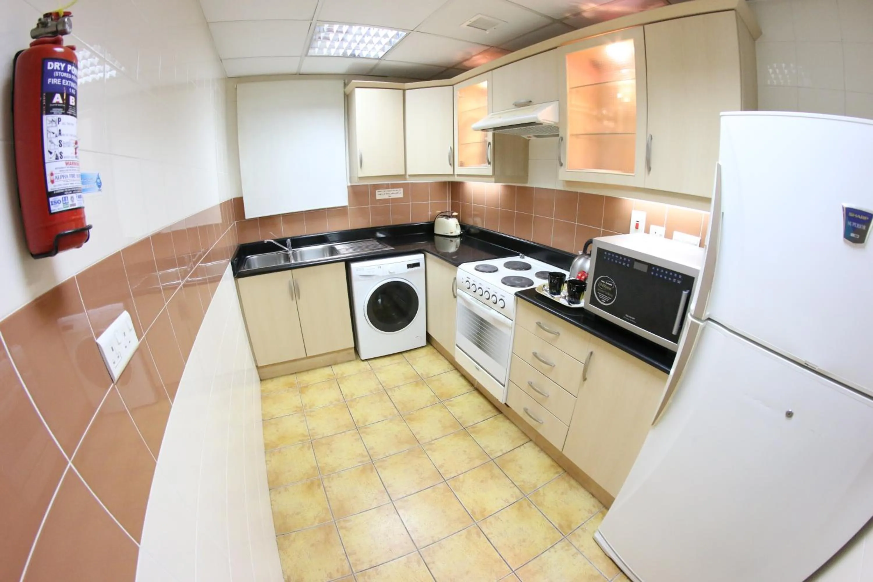 kitchen in Elite Seef Residence And Hotel
