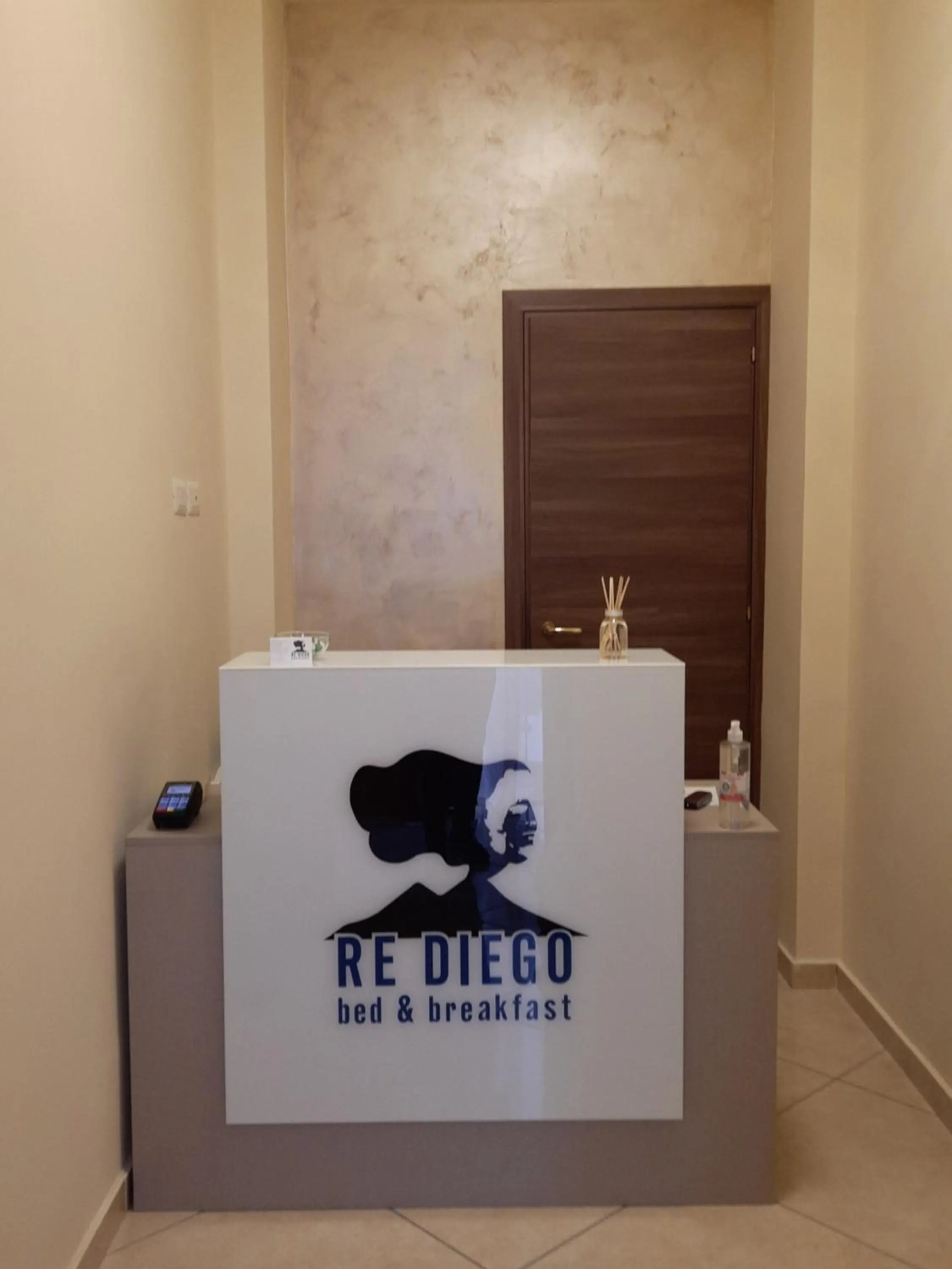 Property logo or sign in Re Diego