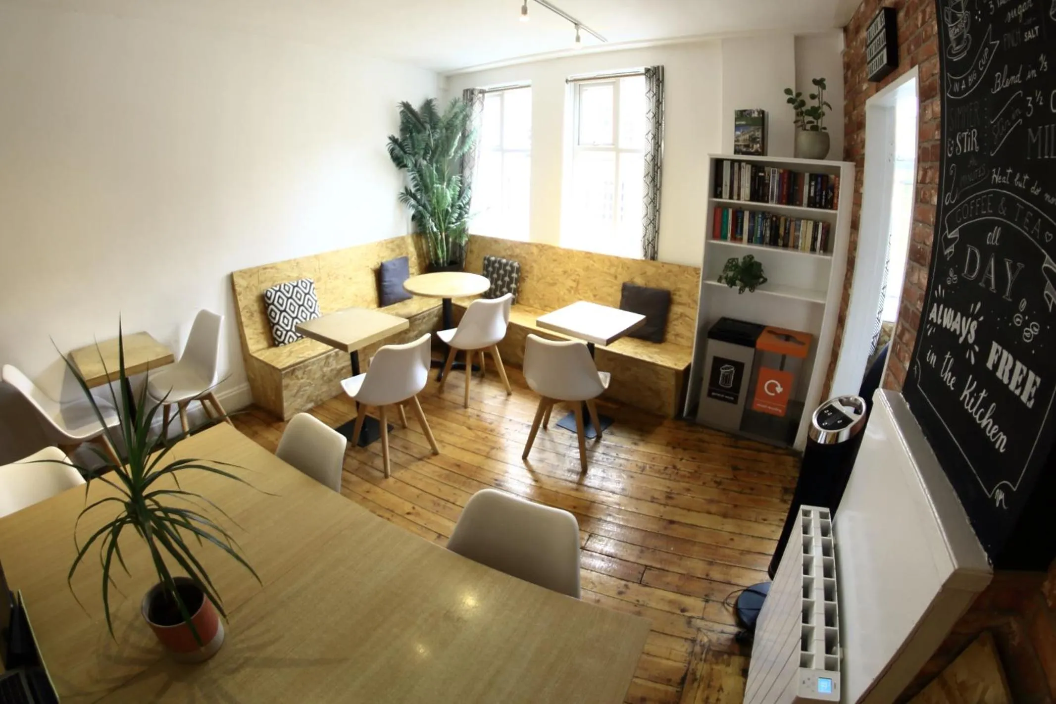 Communal lounge/ TV room in Central Backpackers