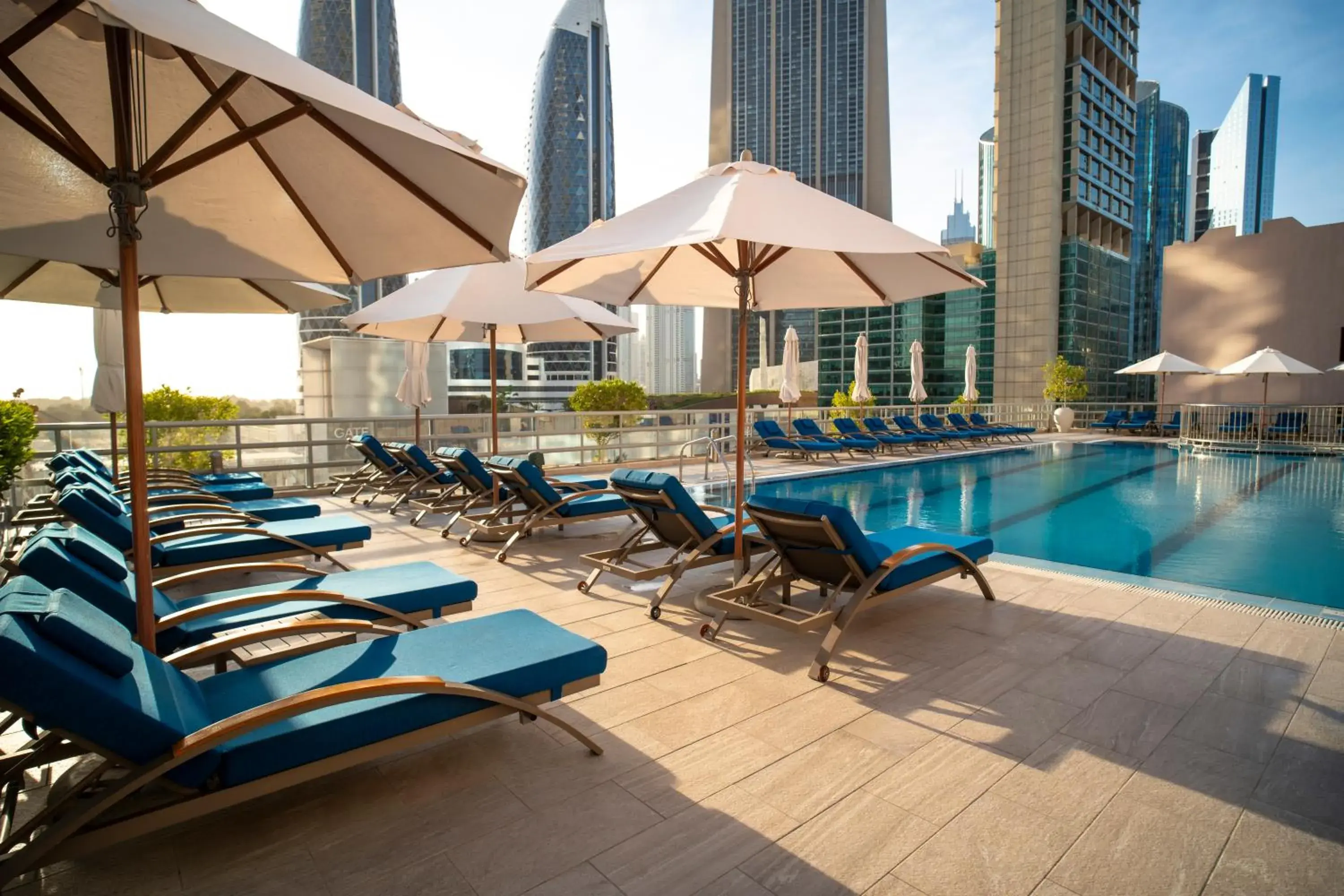 Swimming pool in Rose Rayhaan by Rotana - Dubai Swimming pool in Rose Rayhaan by Rotana - Dubai
