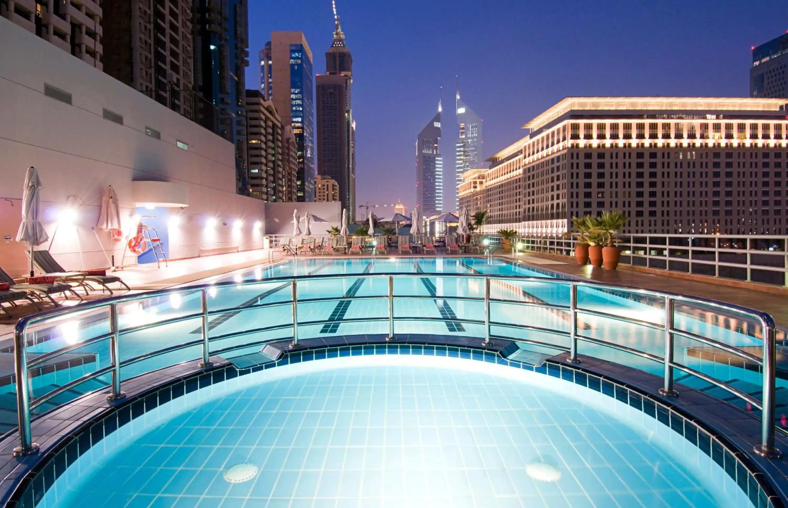 Swimming pool in Rose Rayhaan by Rotana - Dubai Swimming pool in Rose Rayhaan by Rotana - Dubai