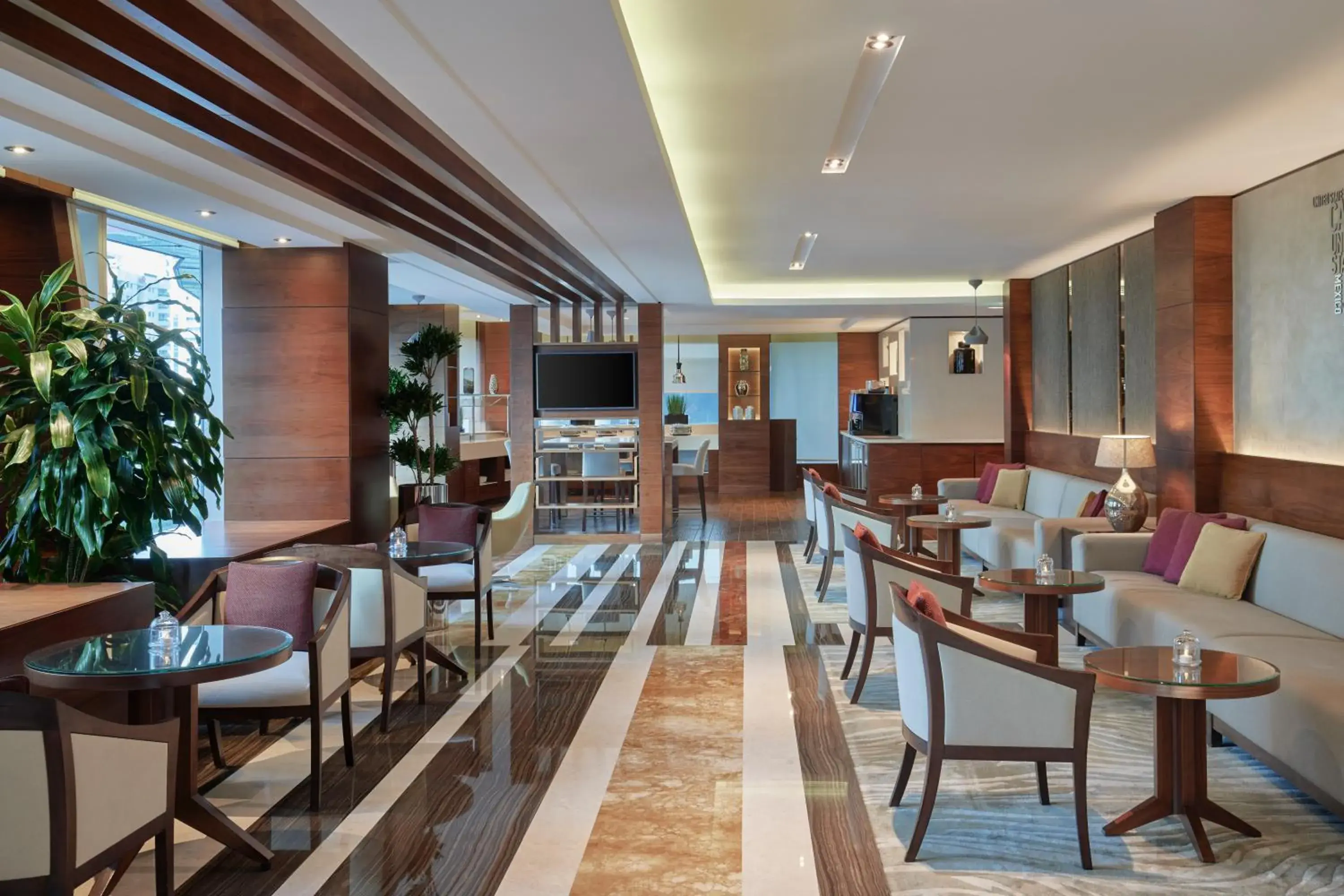 Lounge or bar in Rose Rayhaan by Rotana - Dubai Lounge or bar in Rose Rayhaan by Rotana - Dubai