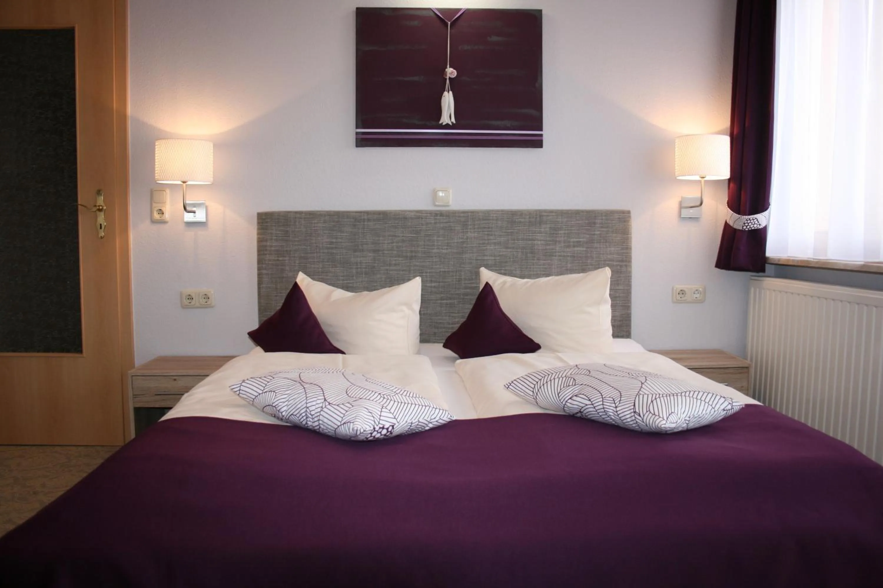 Bed in DAS HUDEWALD Hotel & Resort