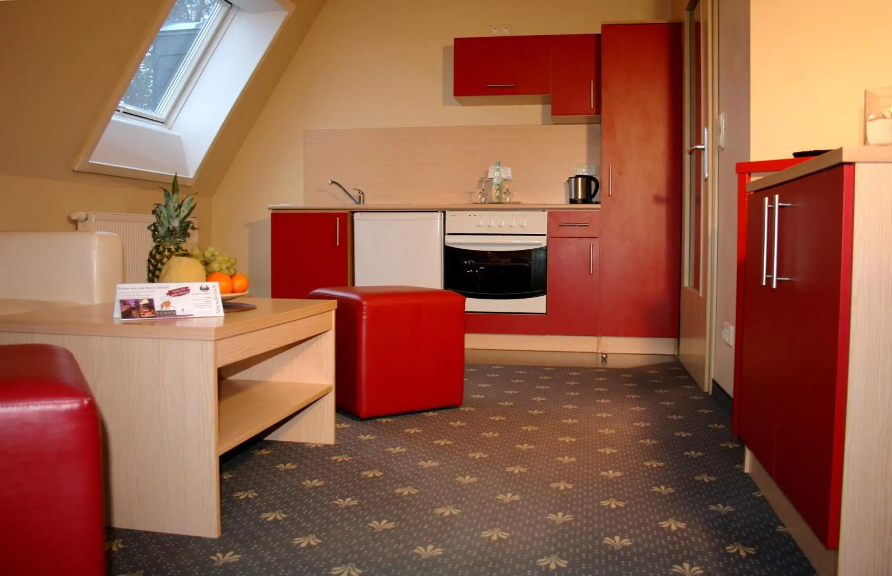 Photo of the whole room, Kitchen/Kitchenette in DAS HUDEWALD Hotel & Resort