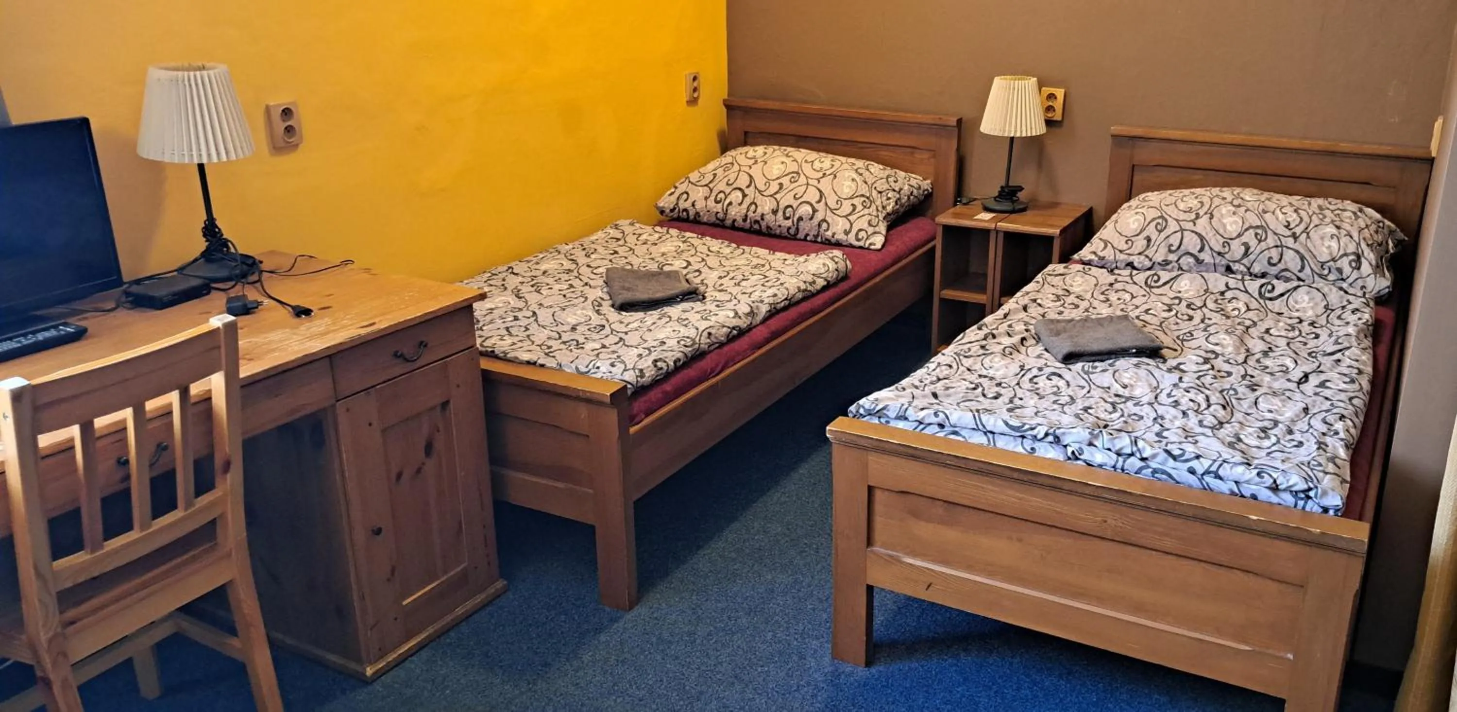 Bed in Hotel Mrázek