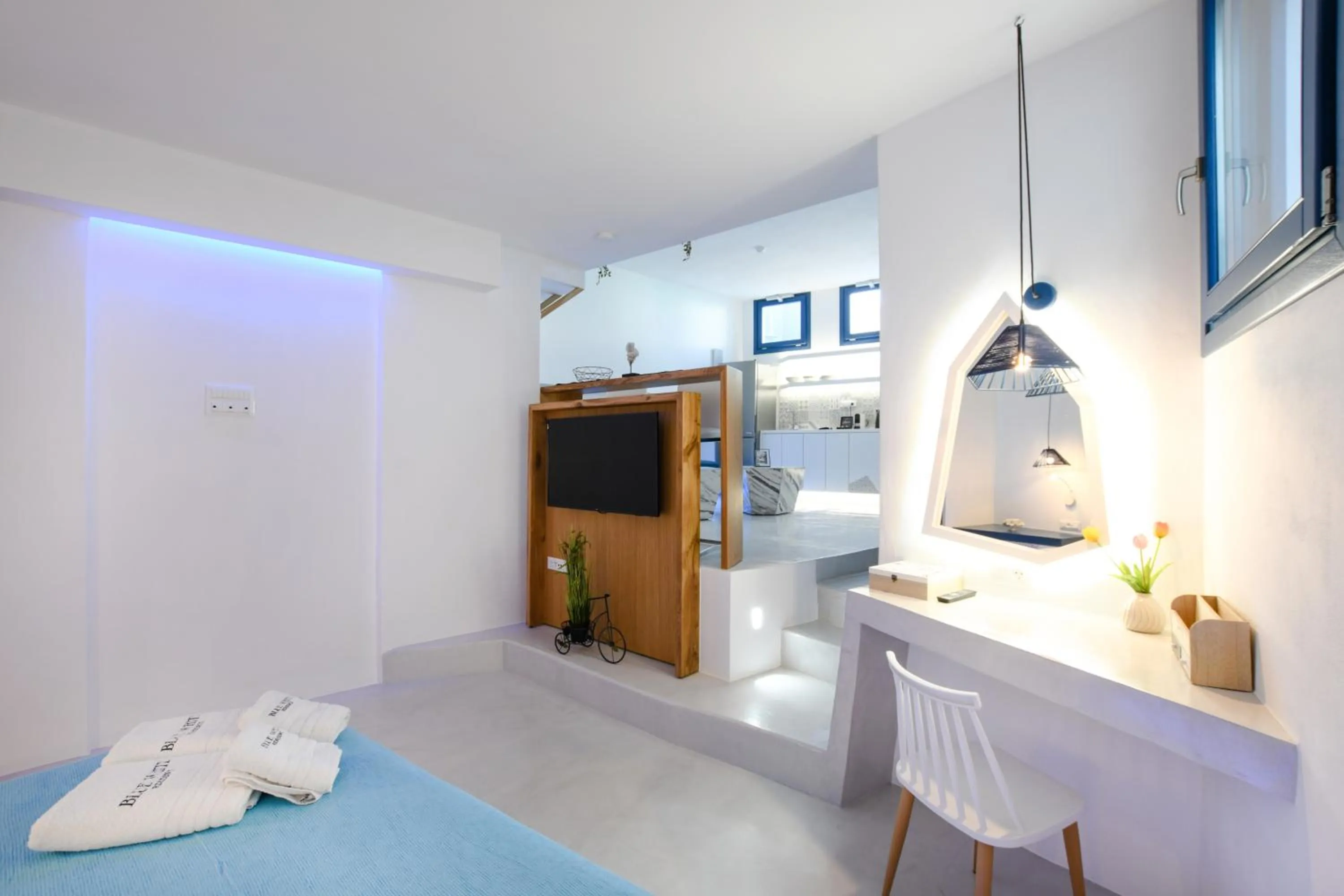 Bed in Blue White Residence